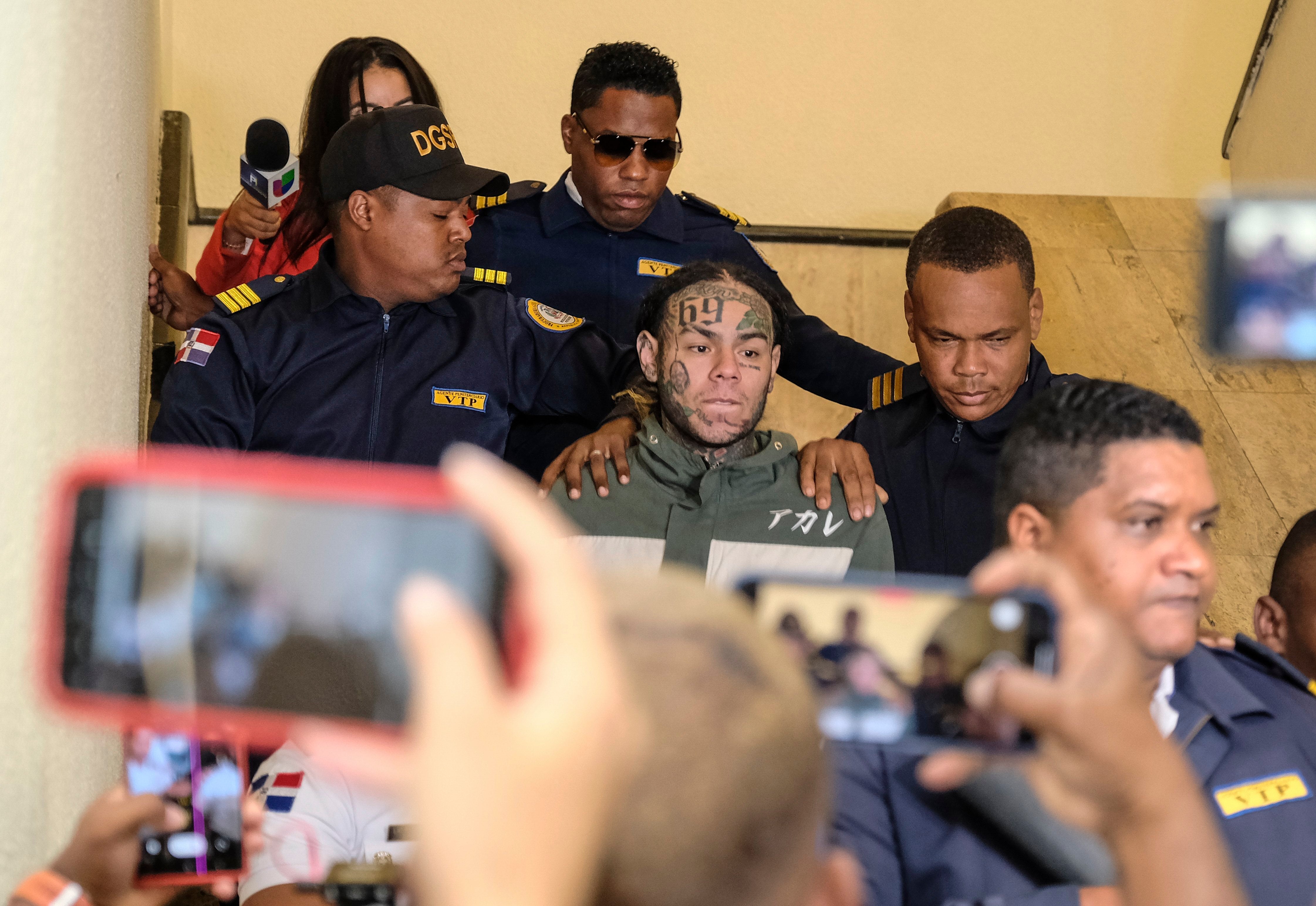 Tekashi 6ix9ine escorted to court in the Dominican Republic