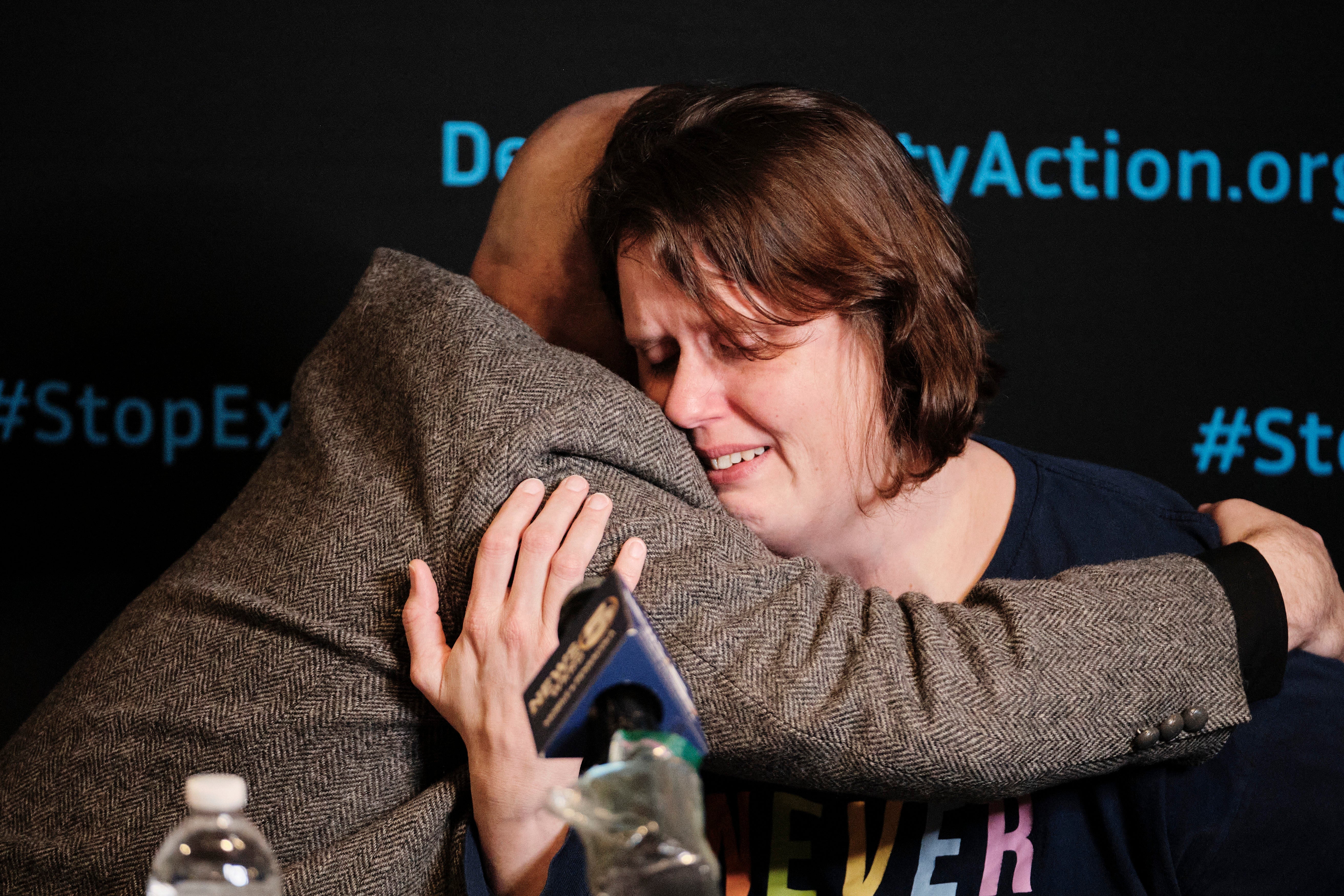 Reverend Dr Jeff Hood (L), the spiritual advisor for convicted killer Kenneth Eugene Smith, comforts Smith’s wife Deanna Smith as she describes the execution of her husband by nitrogen gas