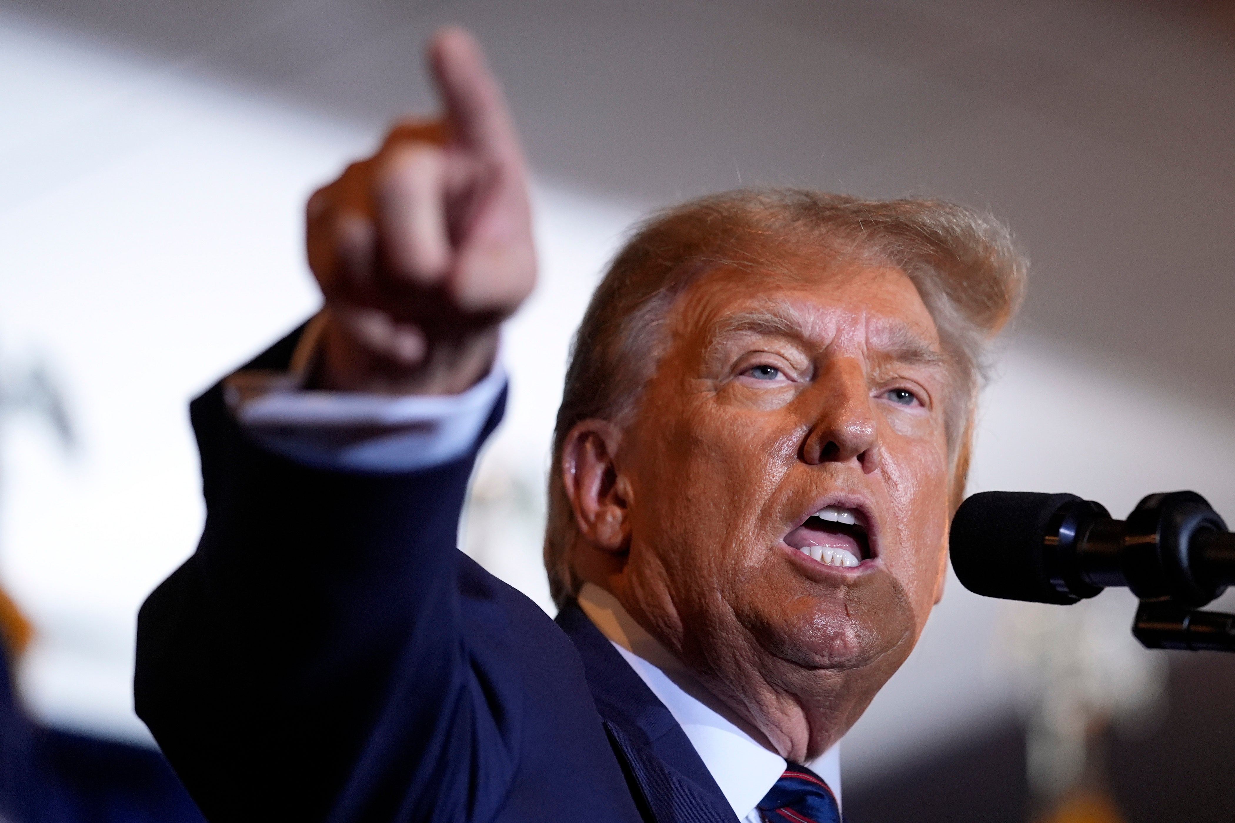 Donald Trump speaks at a primary election rally in New Hampshire