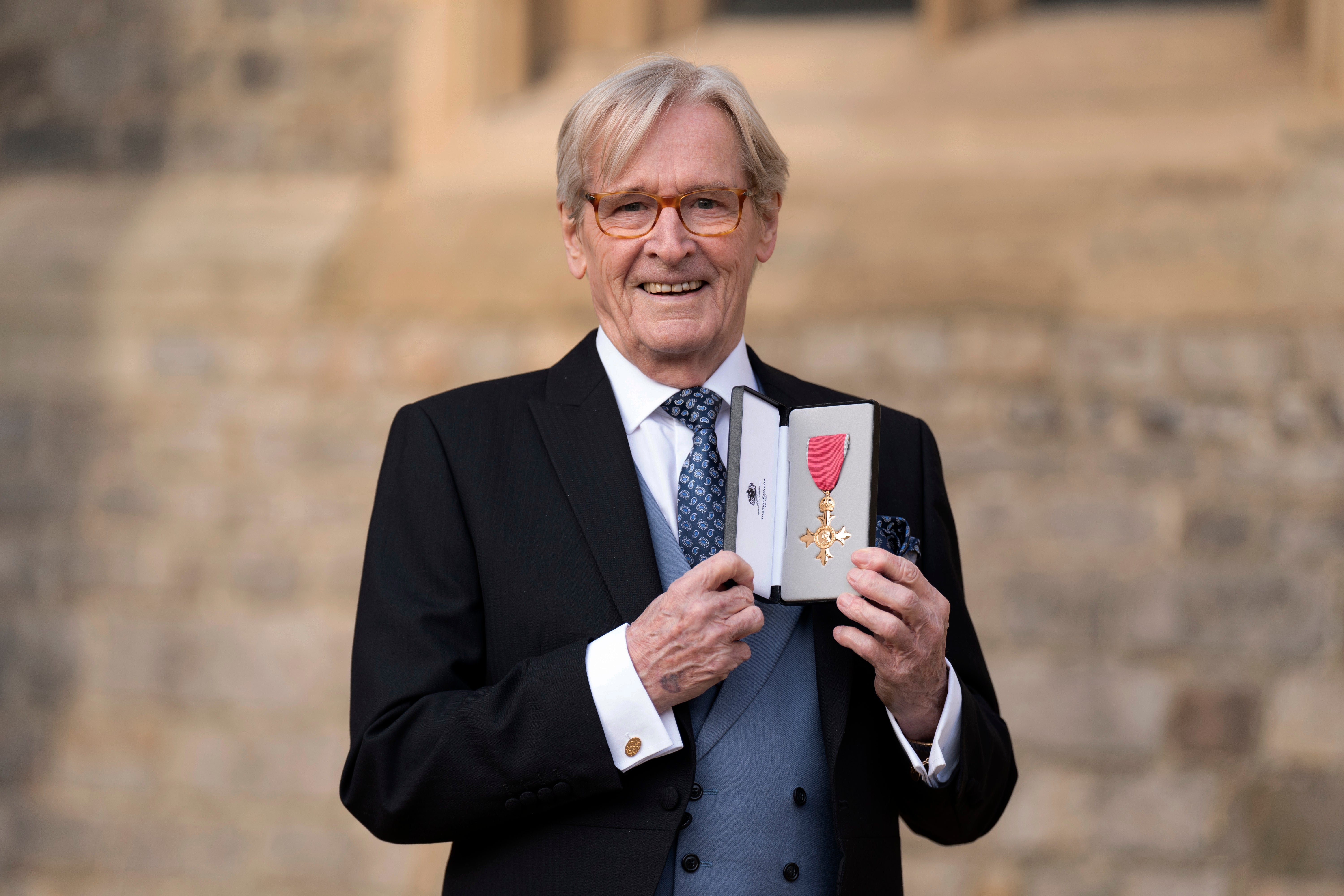 Roache after receiving his OBE in 2022