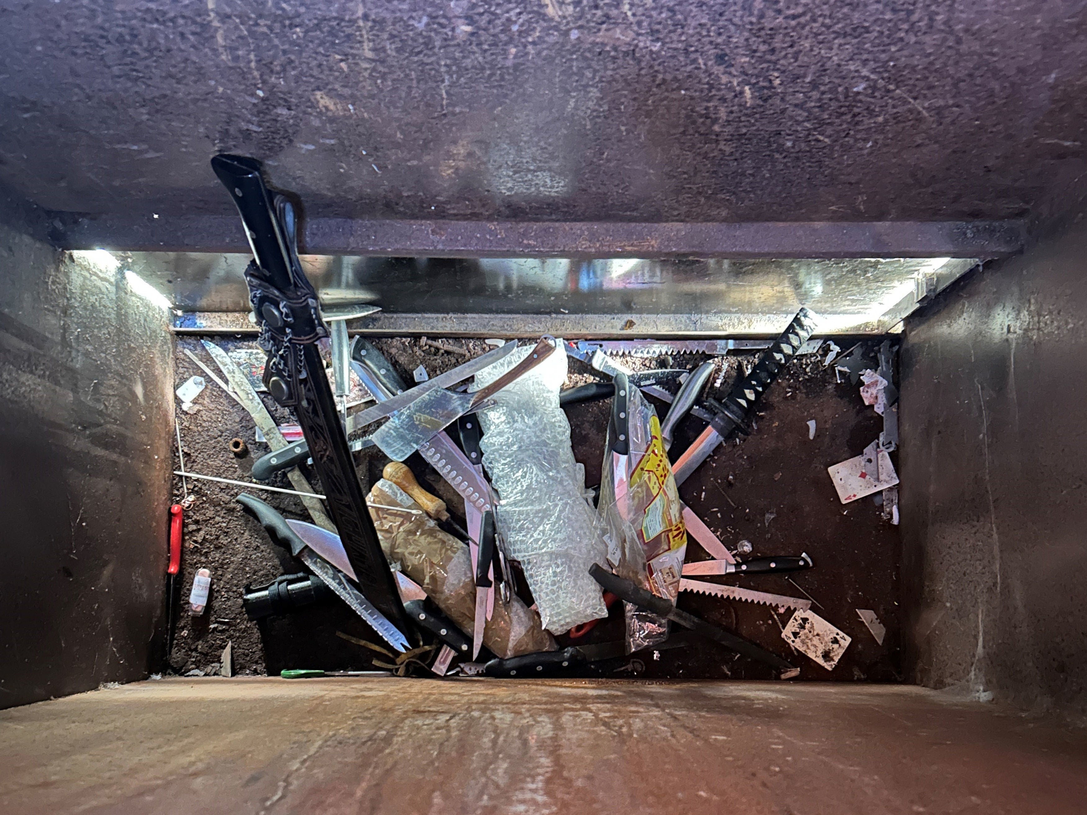 The contents of a knife amnesty bin outside Chelmsford Crown Court in Essex