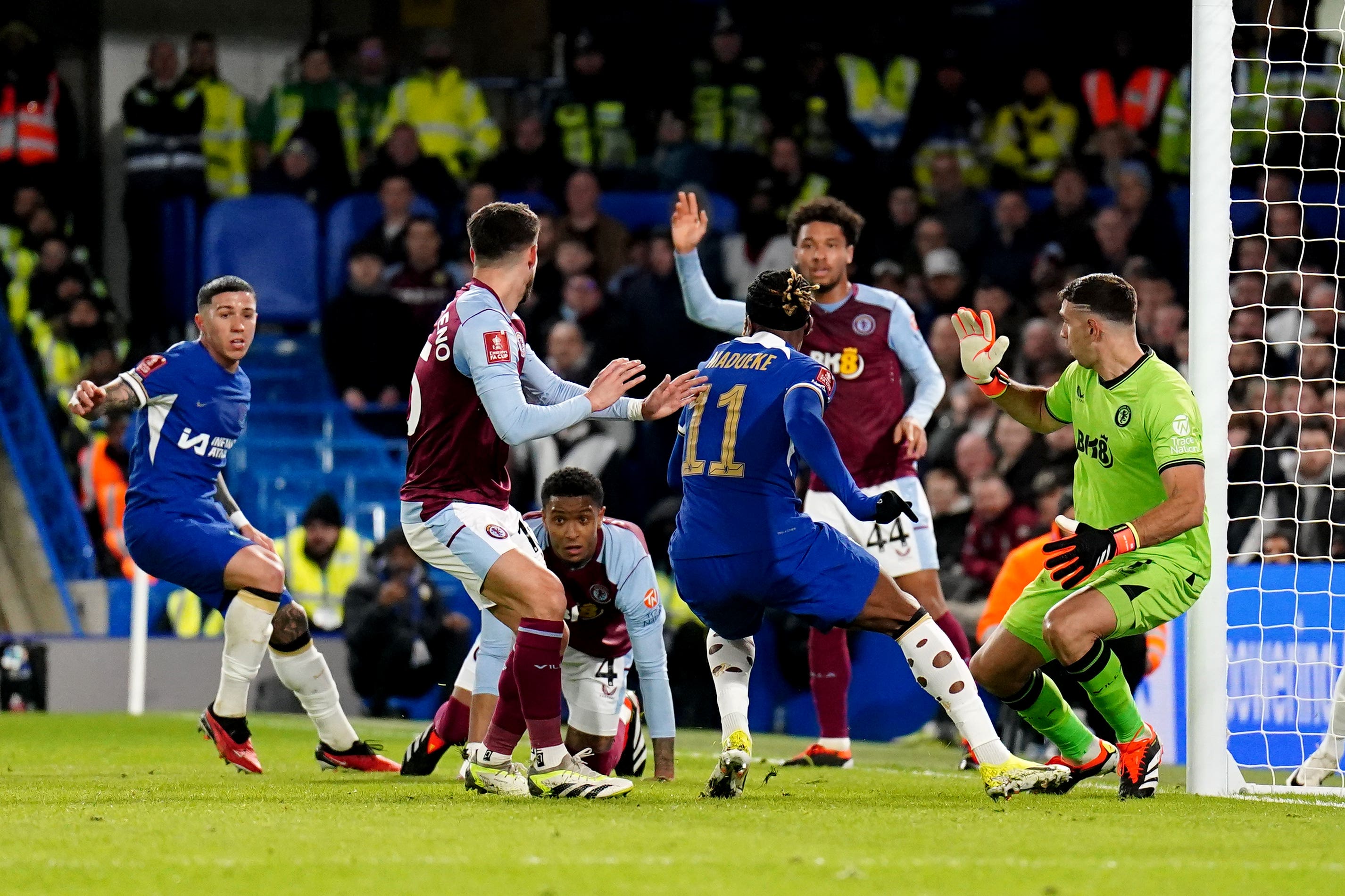 Aston Villa goalkeeper Emiliano Martinez (right) helped his side earn a draw at Chelsea (Zac Goodwin/PA)