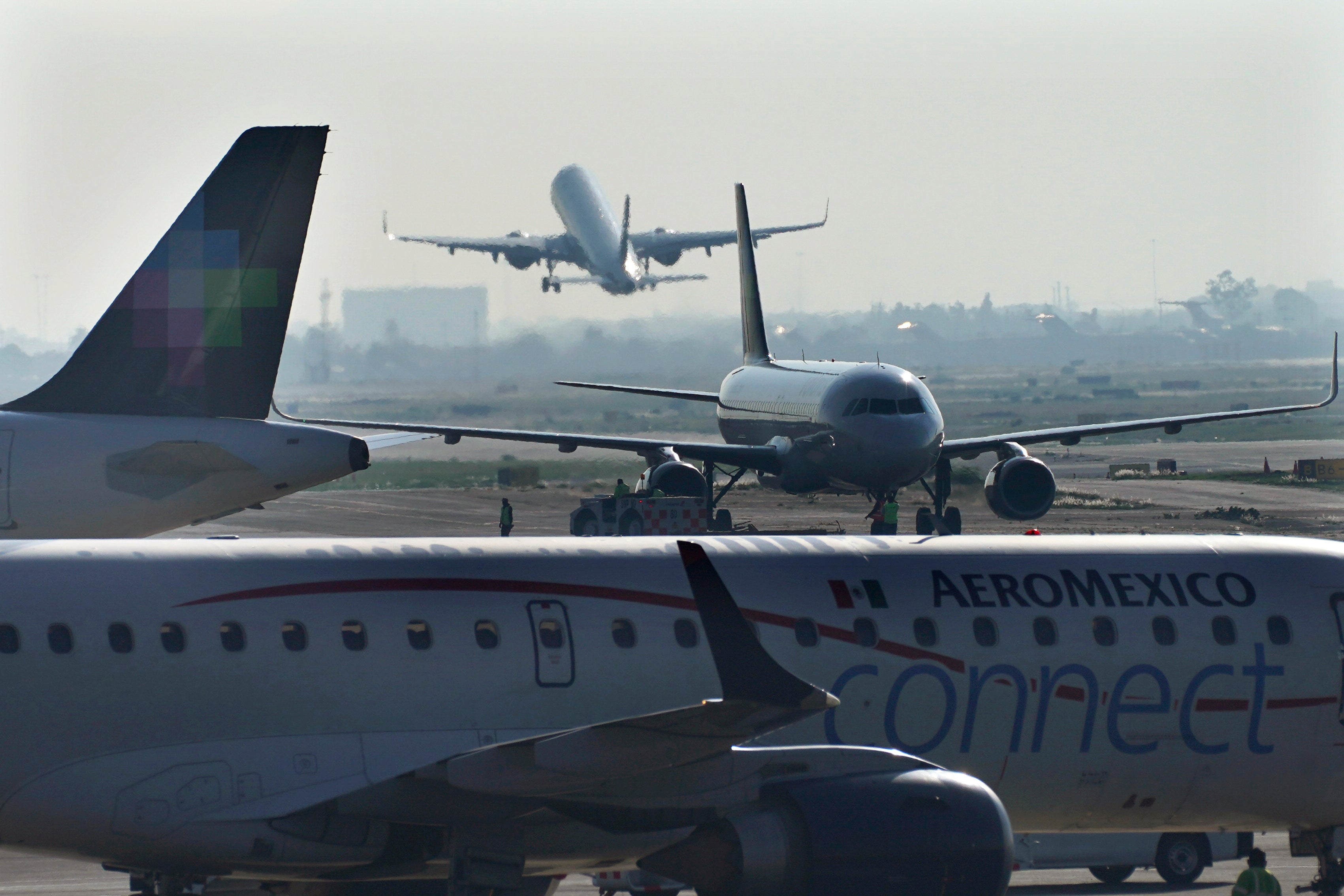 An AeroMexico plane taxis on the tarmac of Benito Juarez International Airport