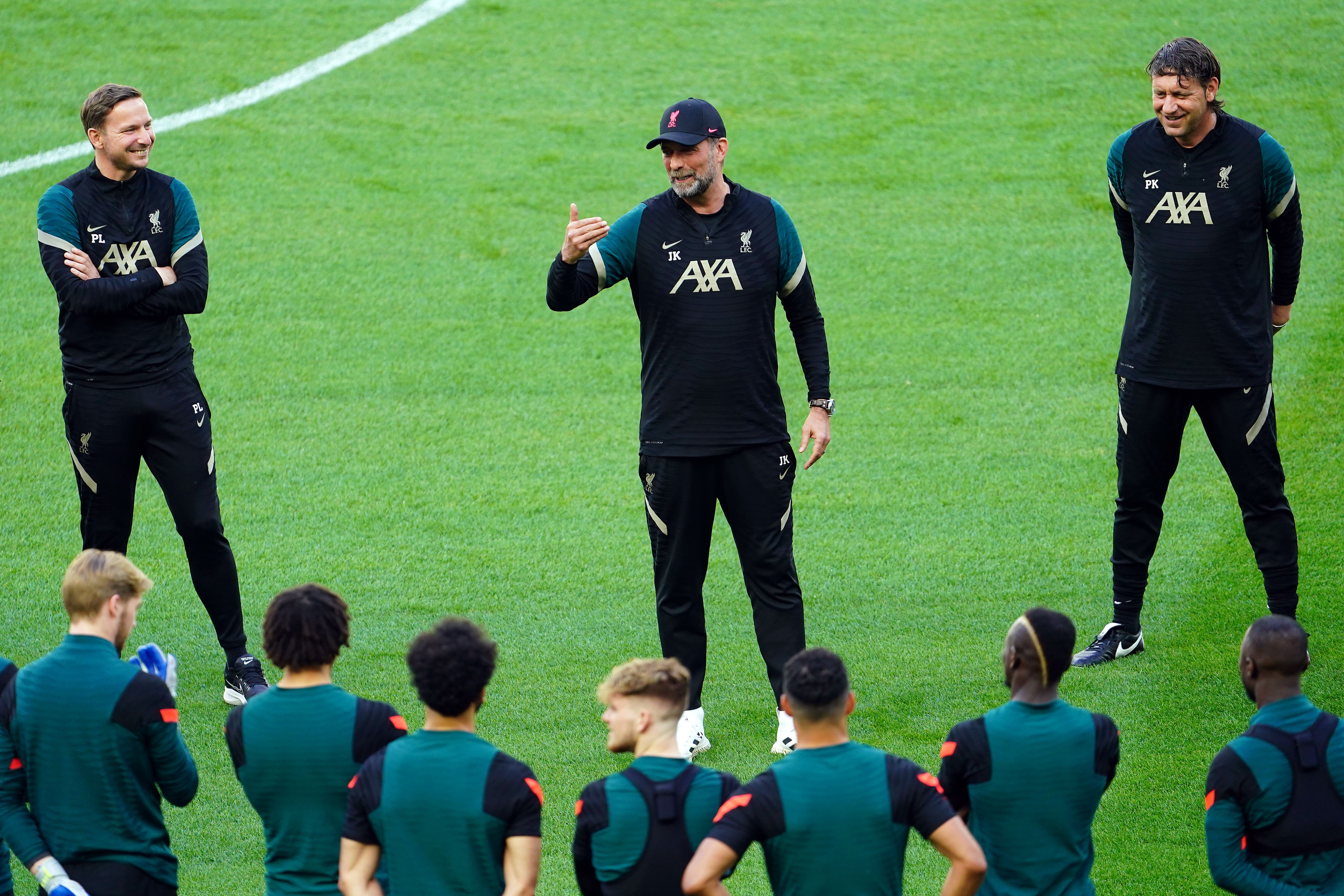 Jurgen Klopp (centre) does not expect news of his departure to affect the Liverpool players’ performances (Adam Davy/PA)