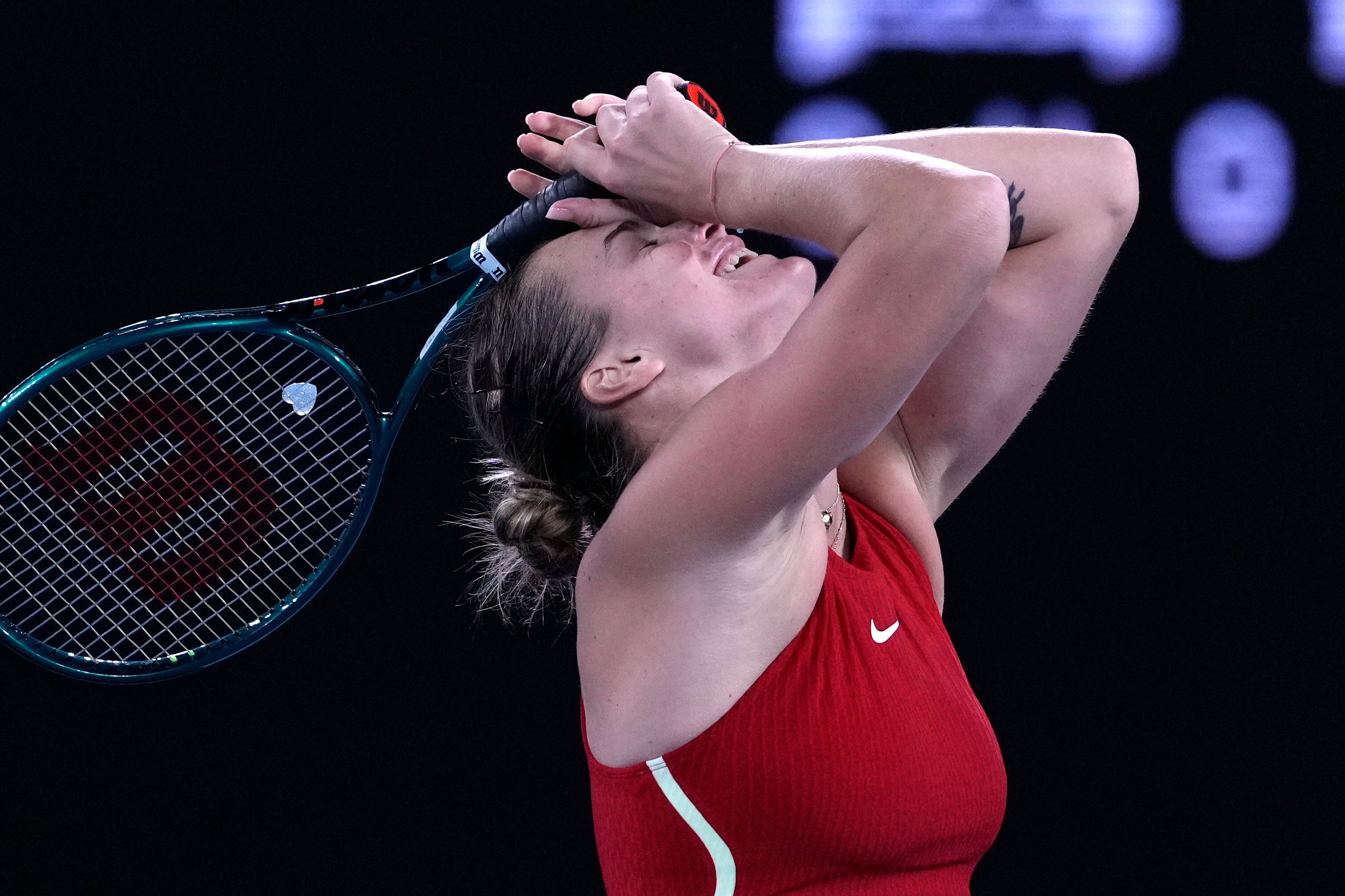 Aryna Sabalenka reacts to her final victory (Alessandra Tarantino/AP)