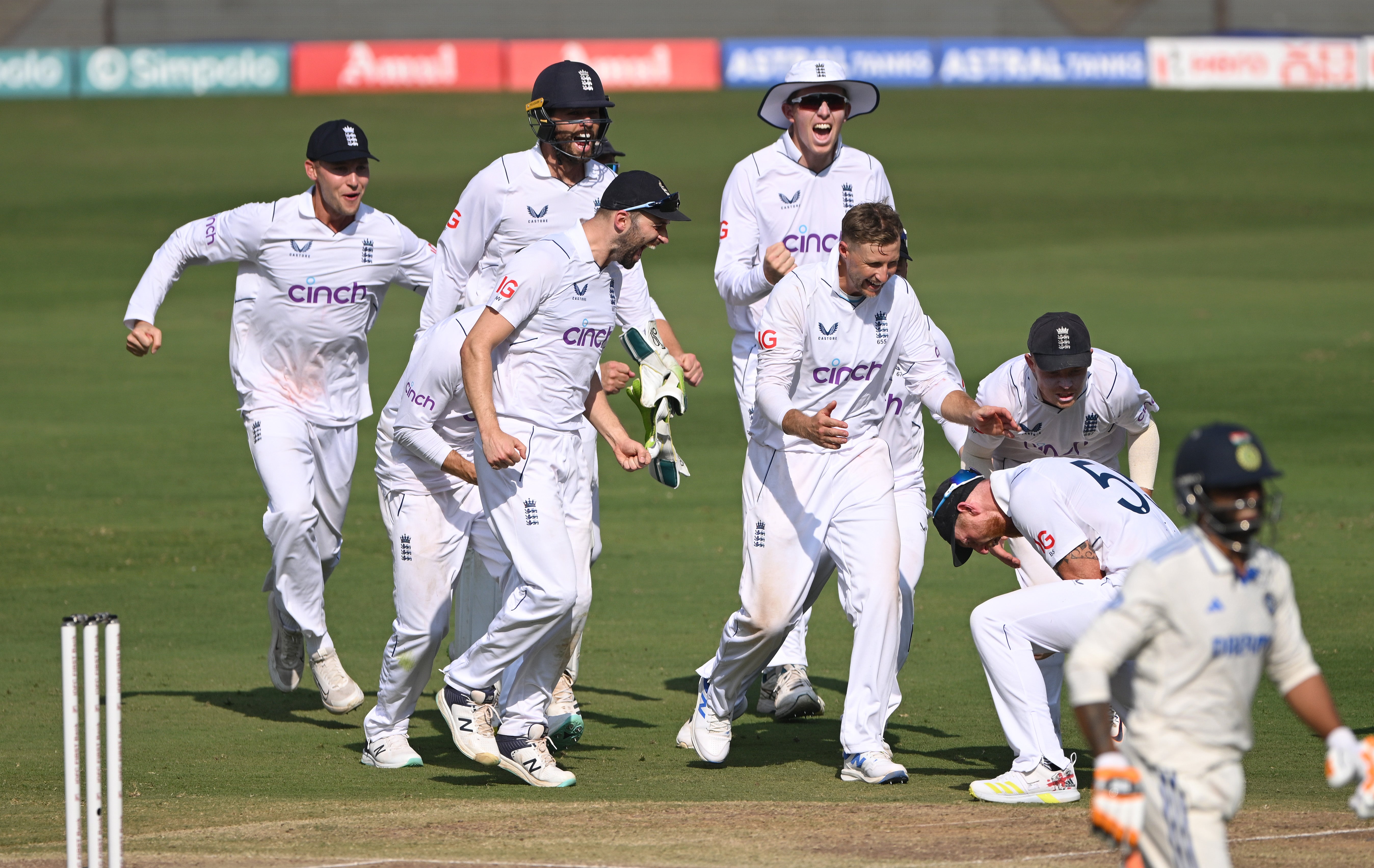 England celebrate Ben Stokes’ remarkable feat in the field