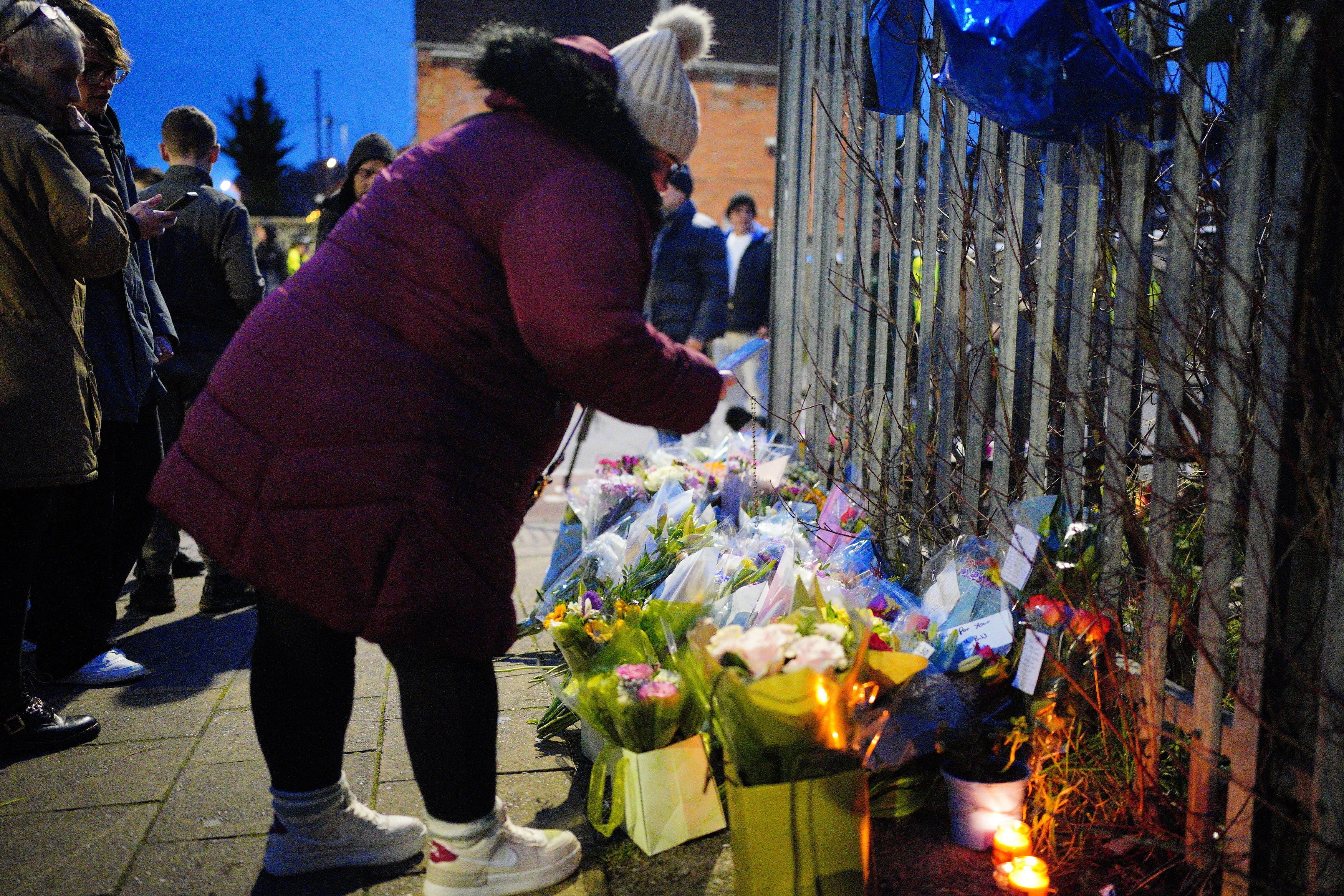 Wellwishers have been leaving flowers and tributes