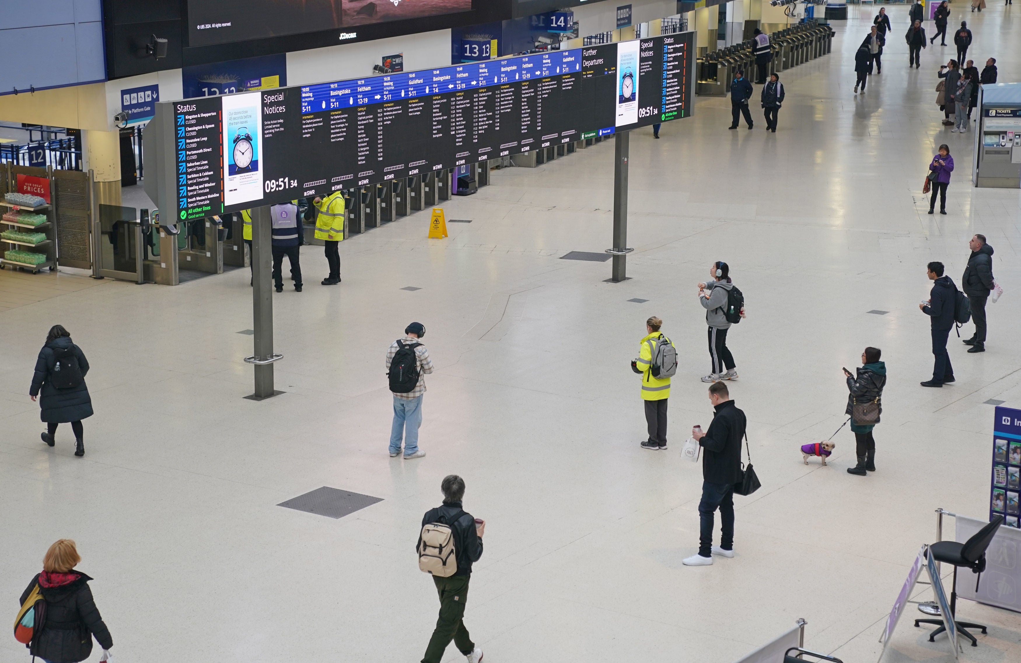 Passengers at Waterloo train station in London, during a strike by members of the Aslef union