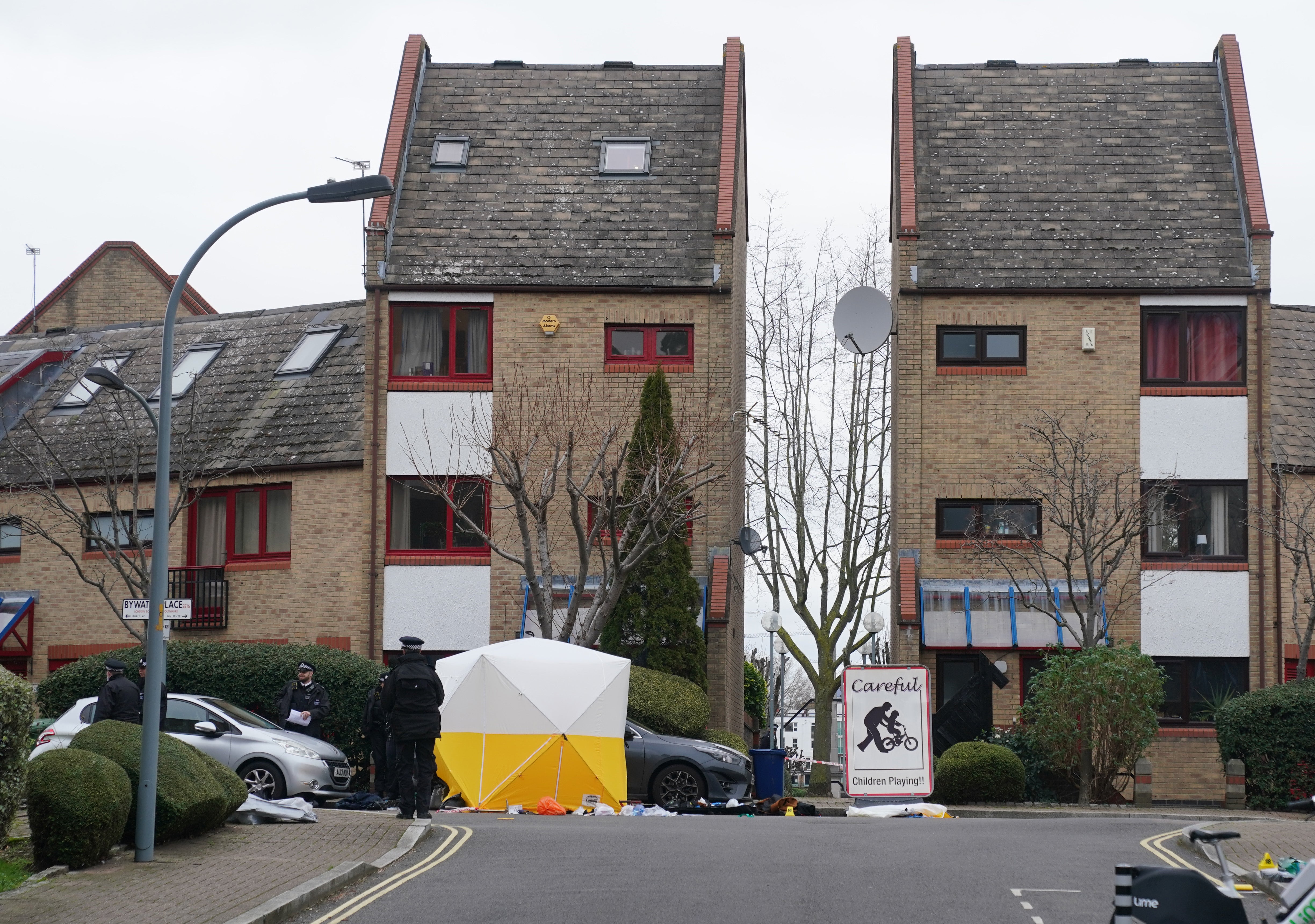 Police officers at the scene near Bywater Place in Surrey Quays