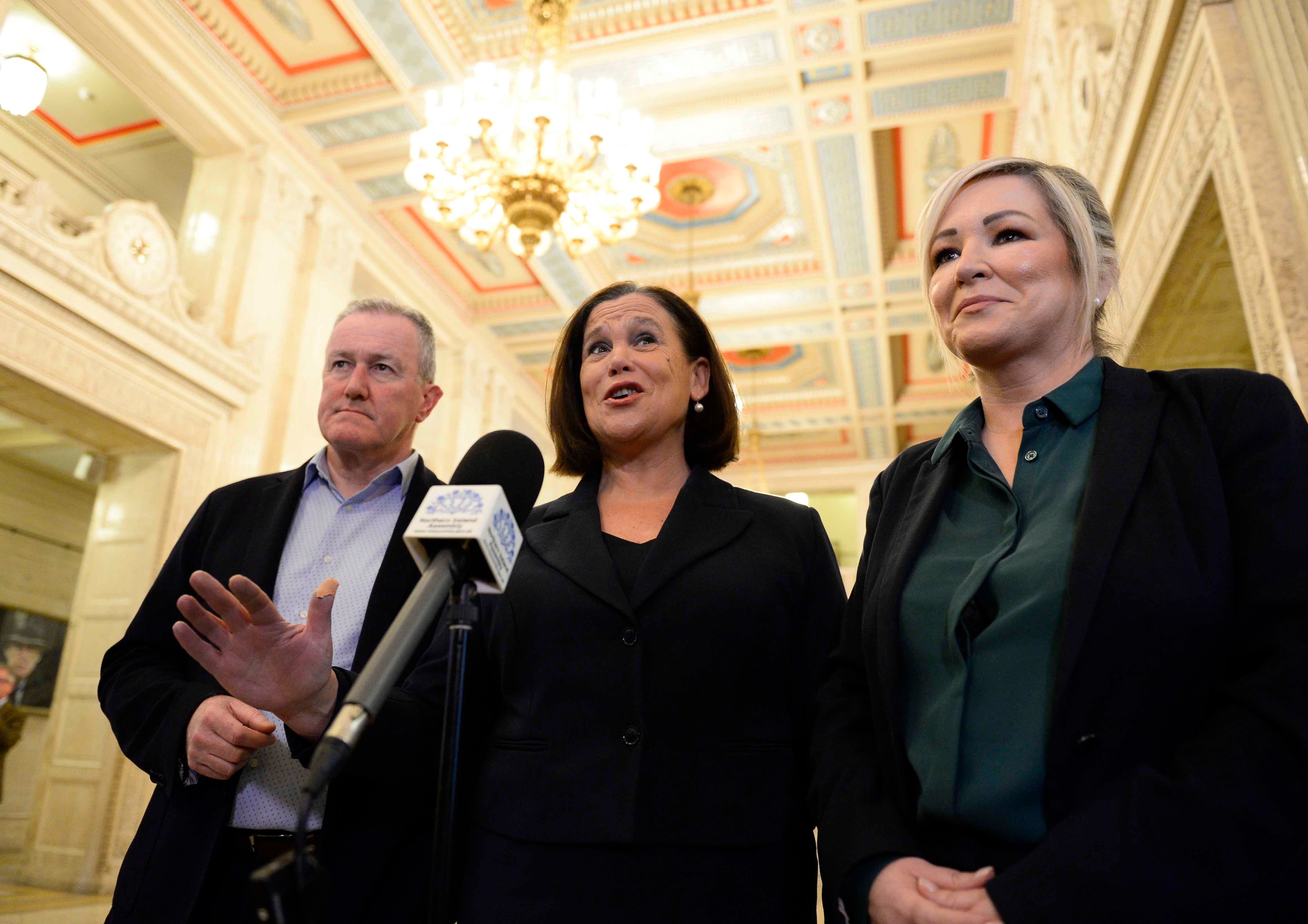 Sinn Fein representatives MLA Conor Murphy, president Mary Lou McDonald and vice-president Michelle O’Neill speak to the media inside Stormont