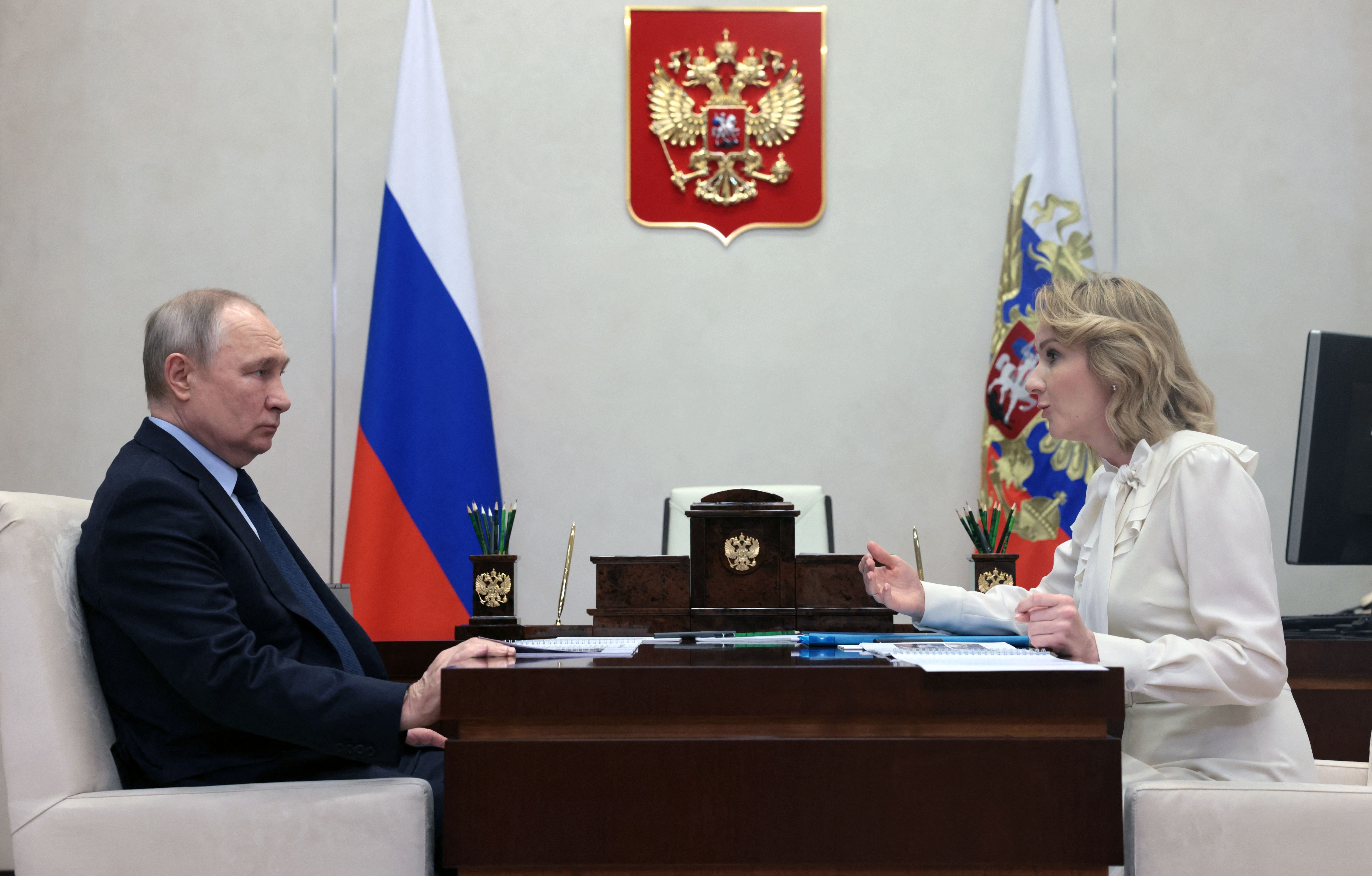 The International Criminal Court (ICC) has issued arrest warrants for Vladimir Putin (left) and Russia’s childrens’ rights commissioner, Maria Lvova-Belova (right)