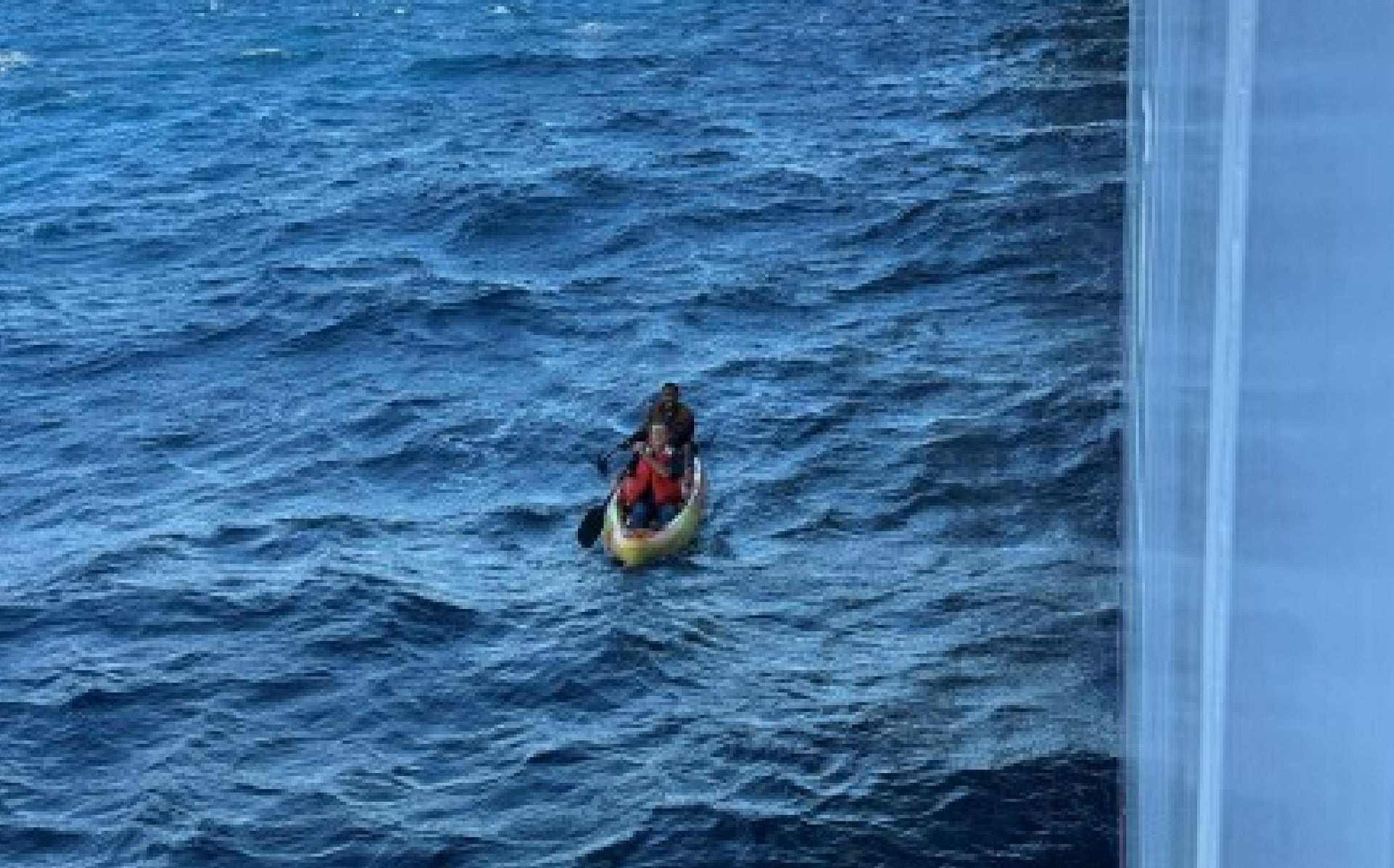 The two men were spotted on a kayak by crew members of the Carnival Jubilee