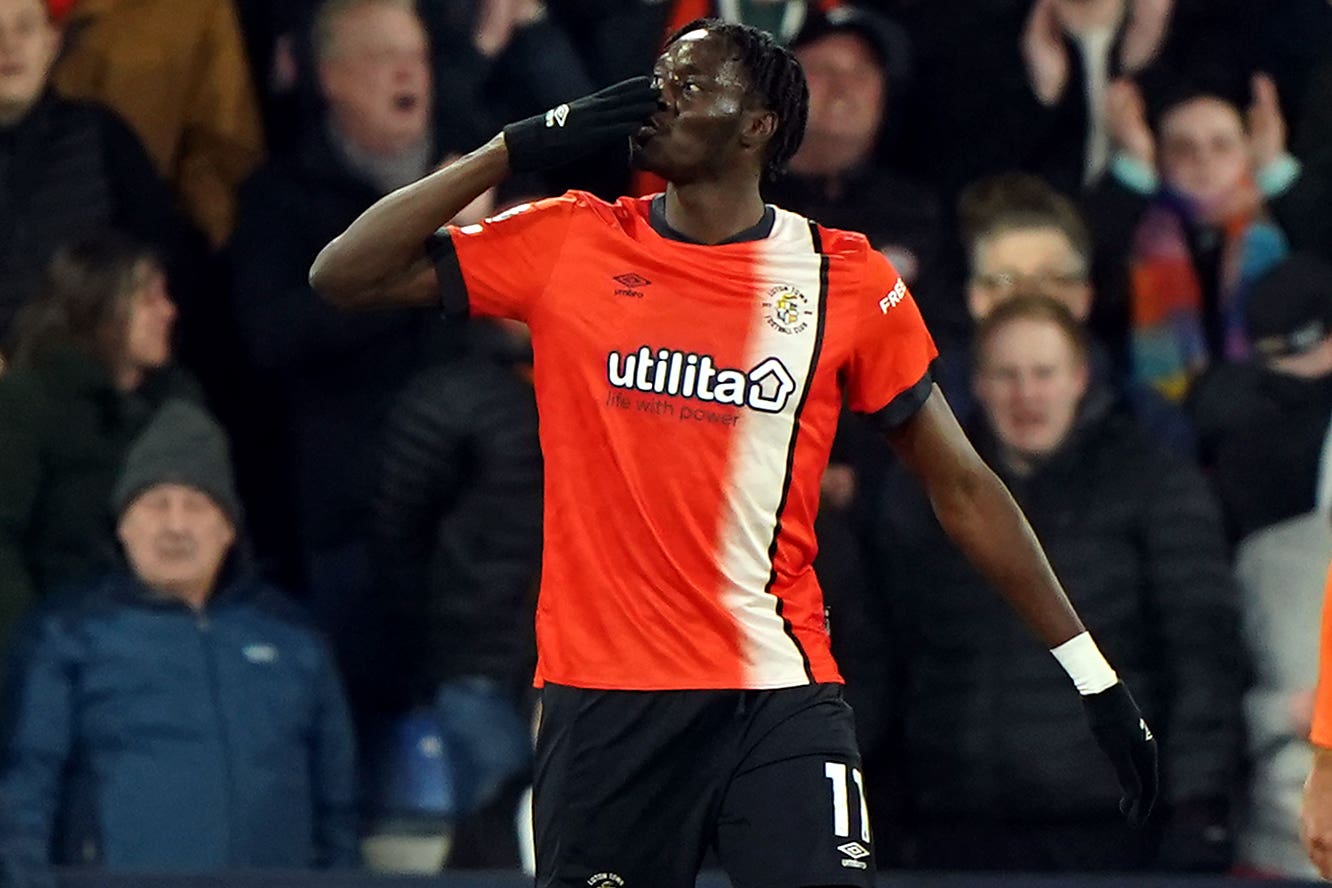 Elijah Adebayo celebrates scoring Luton’s third goal (Joe Giddens/PA)