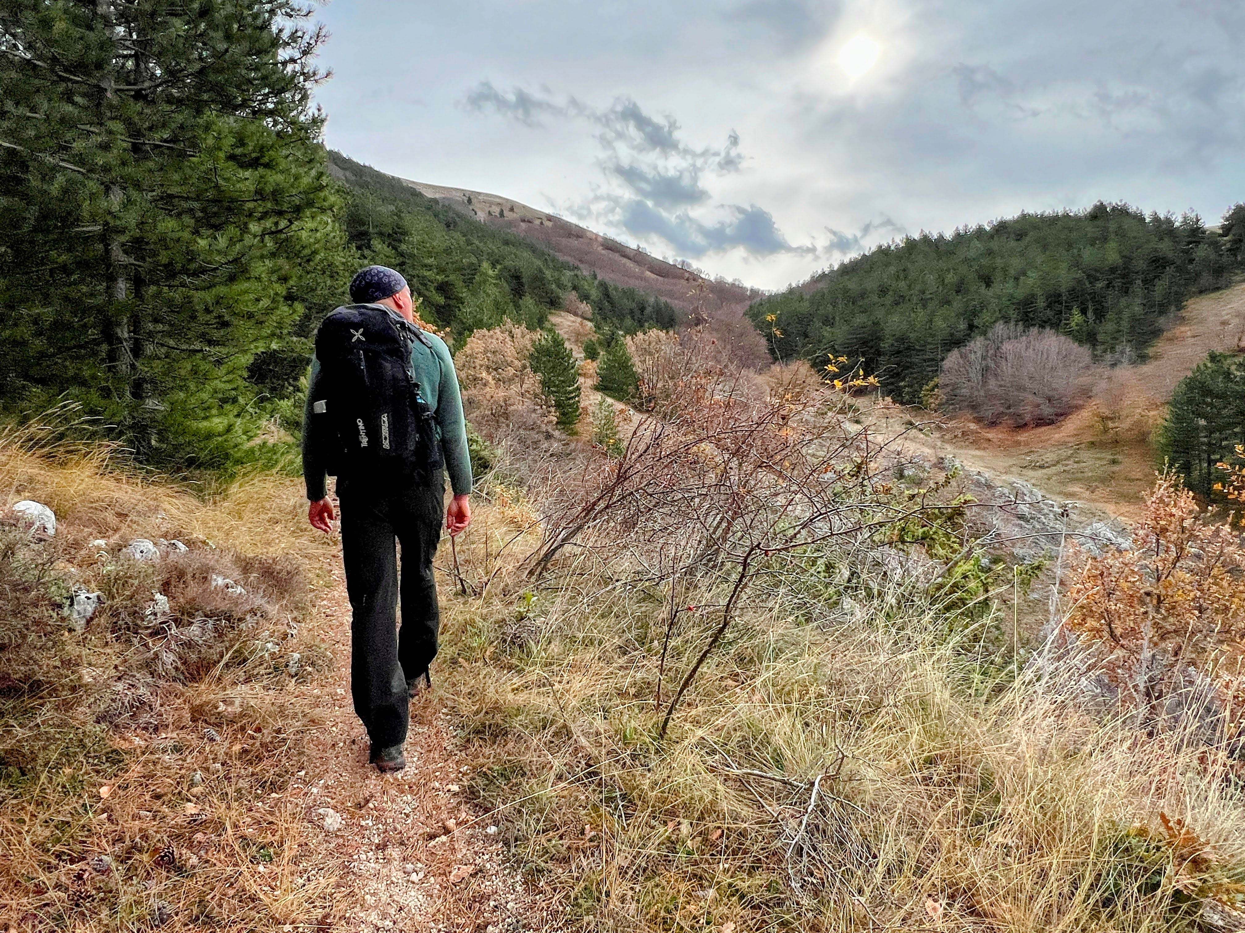 Wildlife guide Andrea De Angelis hikes through the wilderness