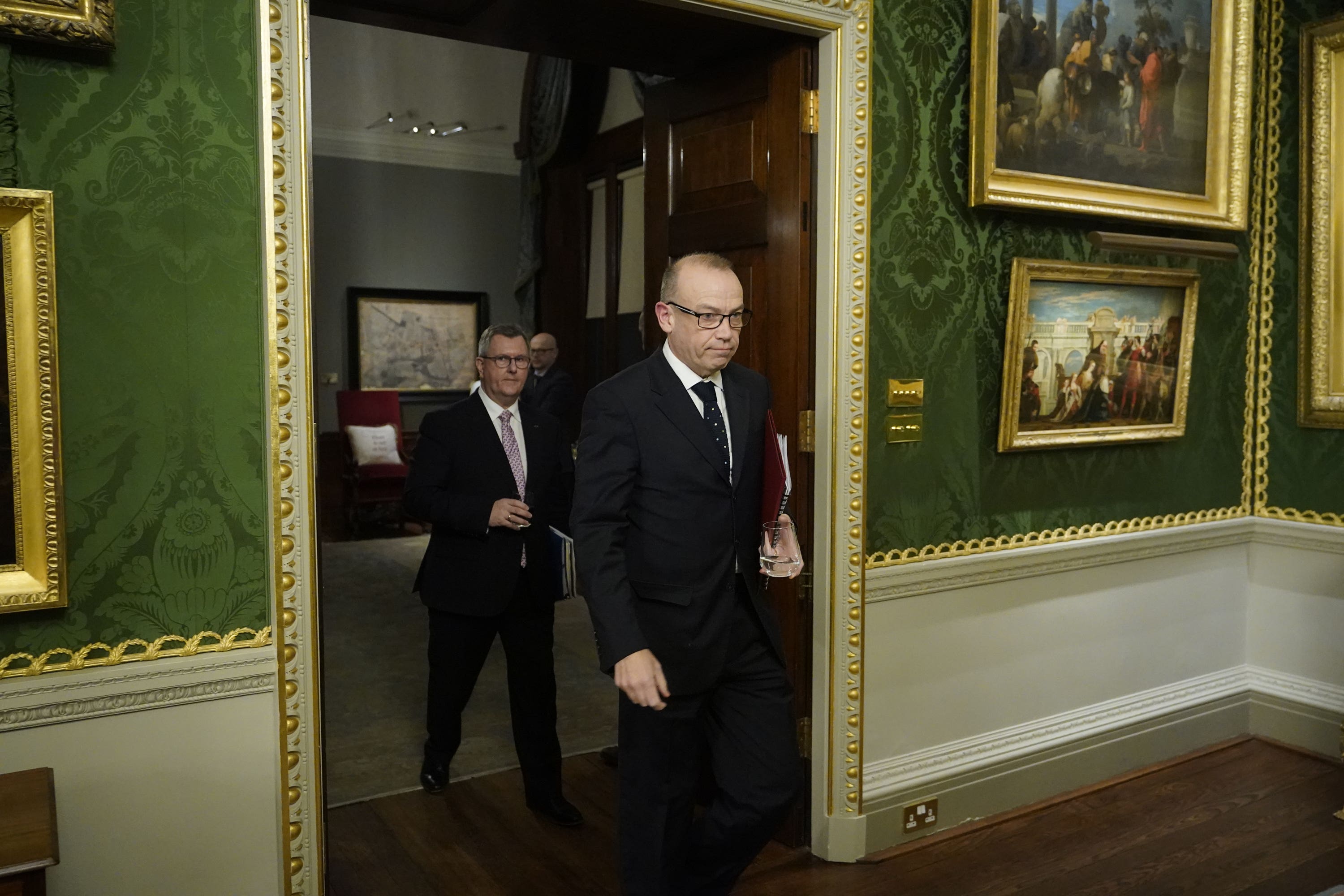 Chris Heaton-Harris followed by Sir Jeffrey Donaldson arrive to hold a joint press conference at Hillsborough Castle (Niall Carson/PA)