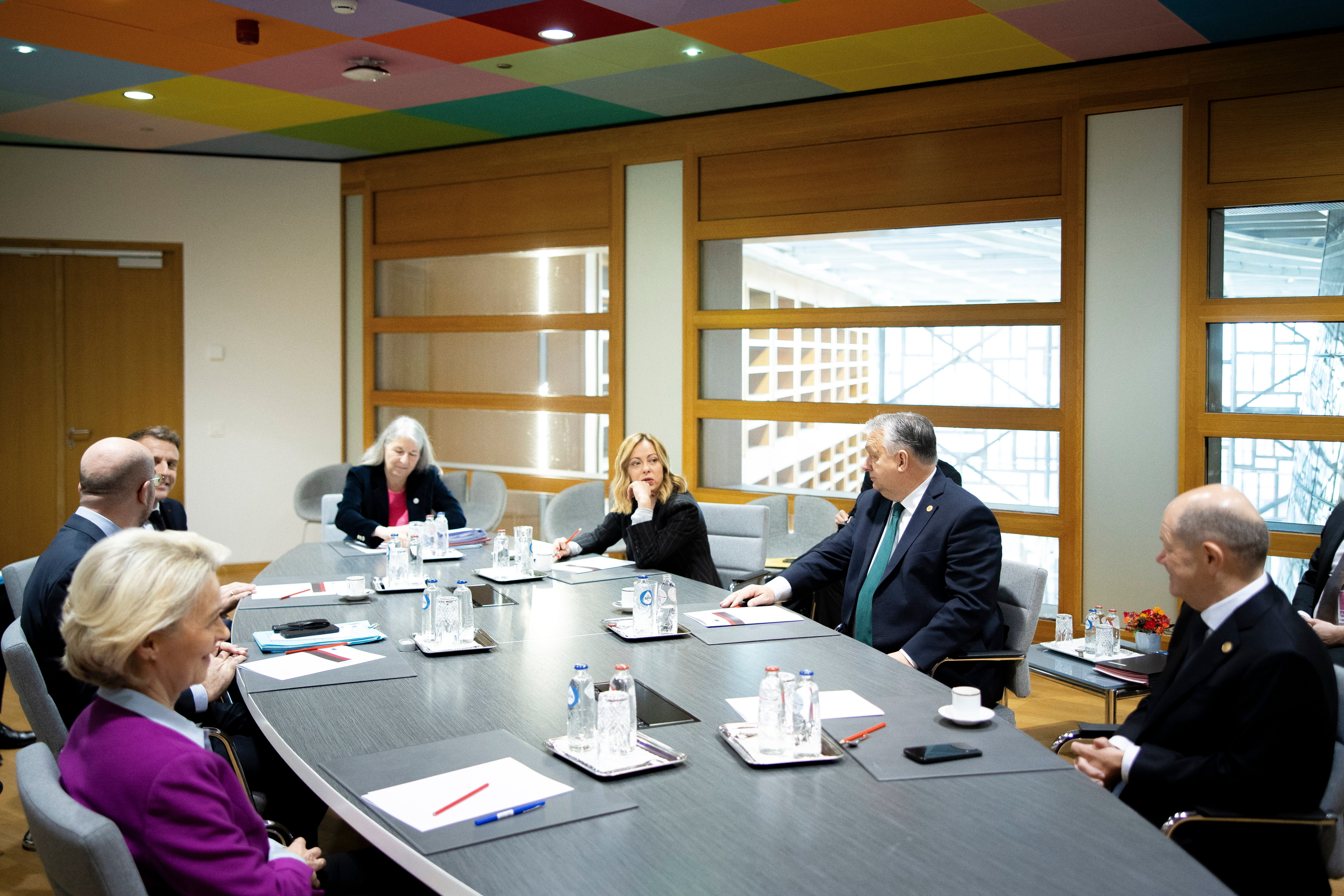 Hungarian prime minister Viktor Orban (2R) sits down with the European Union’s top leaders to discuss aid to Ukraine