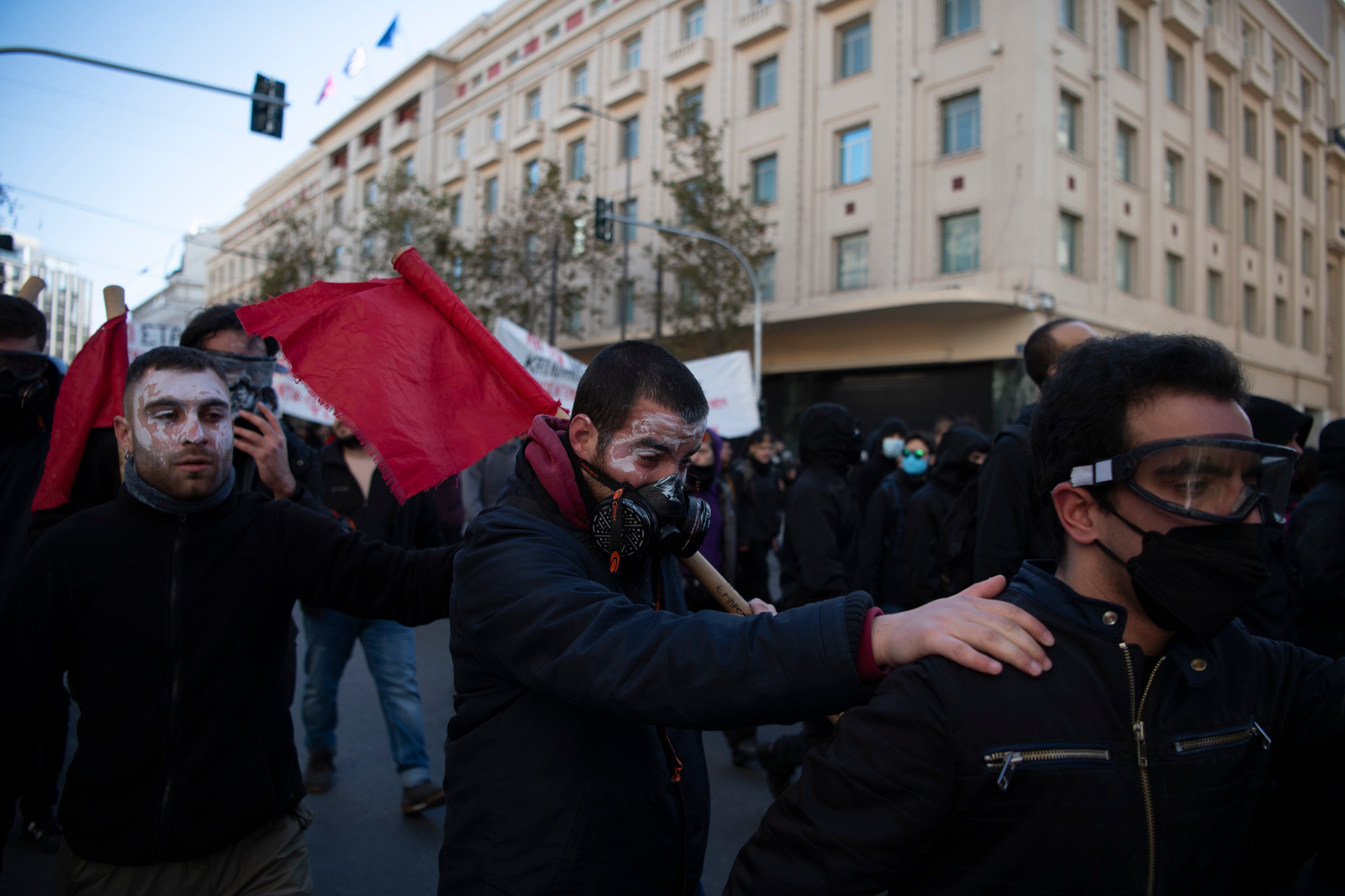 Riot police clash with students during a demonstration in Greece