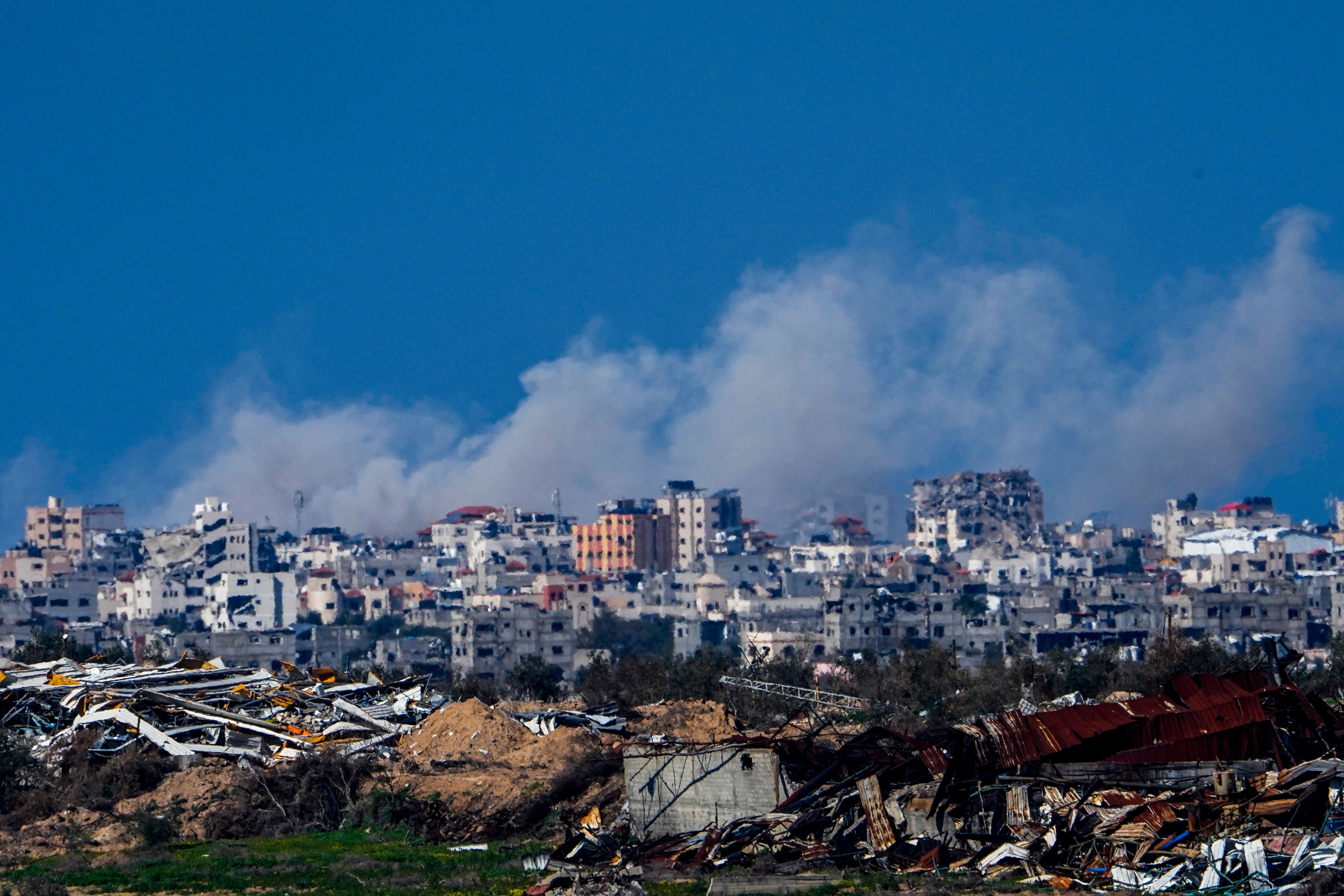 Smoke rises from buildings following strikes in Gaza