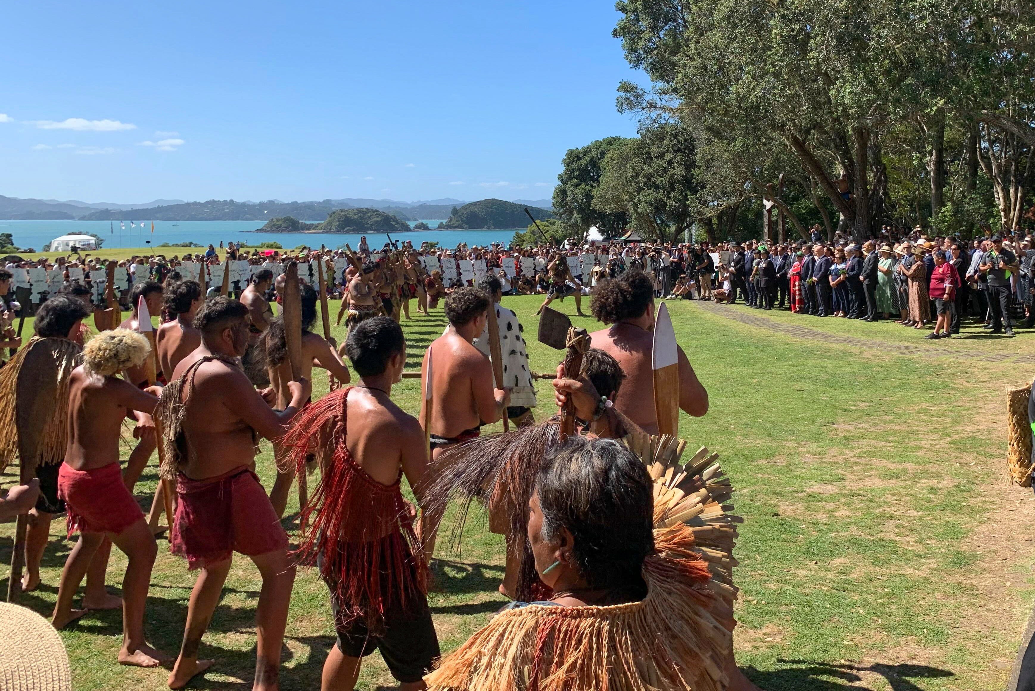 New Zealand prime minister Christopher Luxon and officials being welcomed by Maori in February