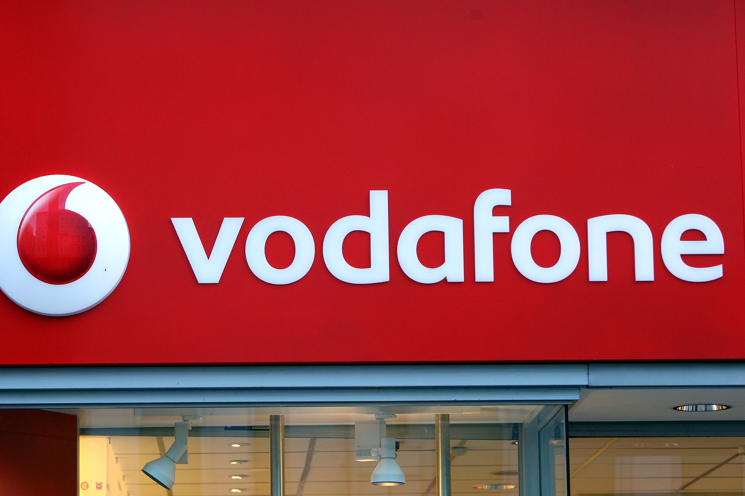 Vodafone has revealed an increase in UK sales after the group won more mobile and broadband customers (Paul Faith/PA)