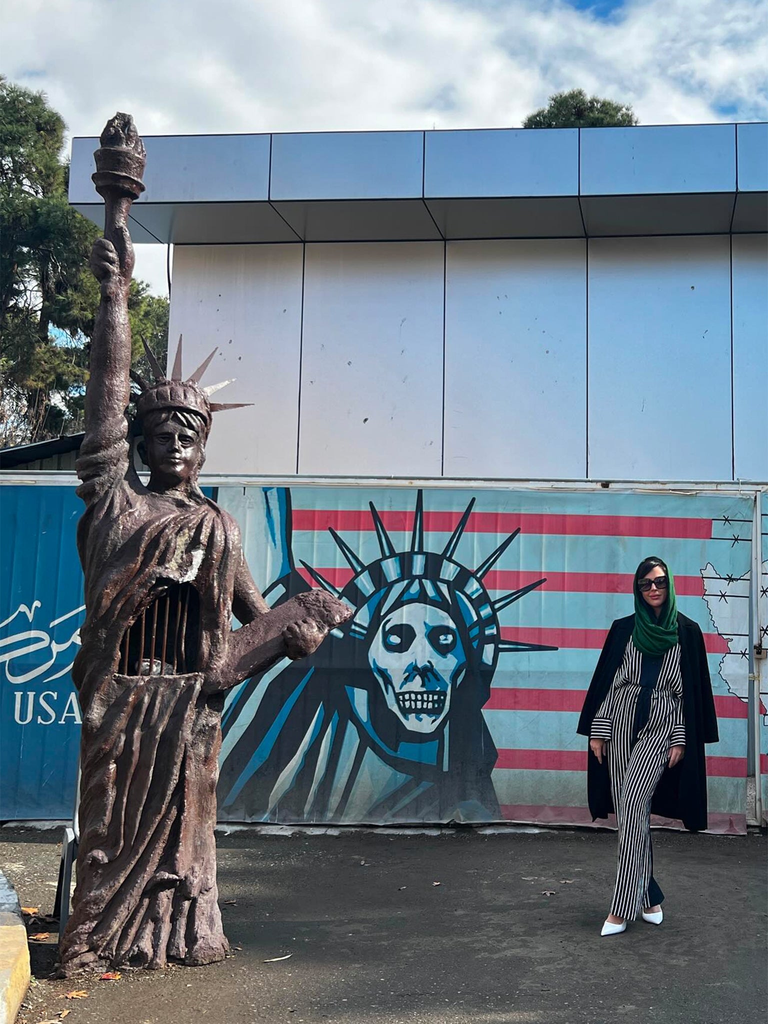 Whitney Wright, American porn star on visit to Iran outside the former American embassy