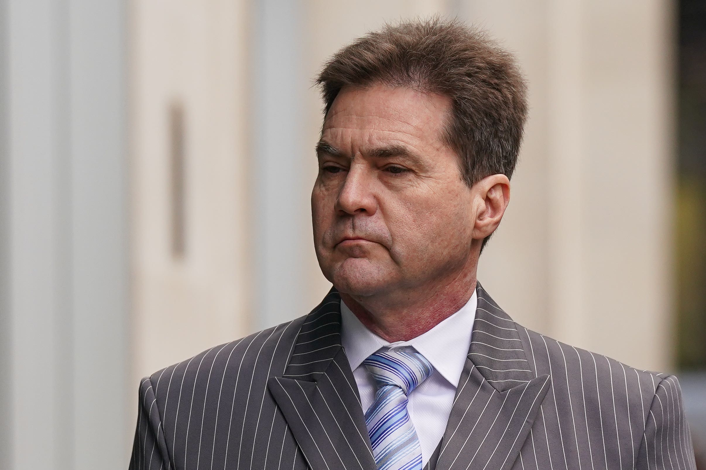 Craig Wright arrives at the Royal Courts of Justice in London to defend claims that he is the founder of bitcoin