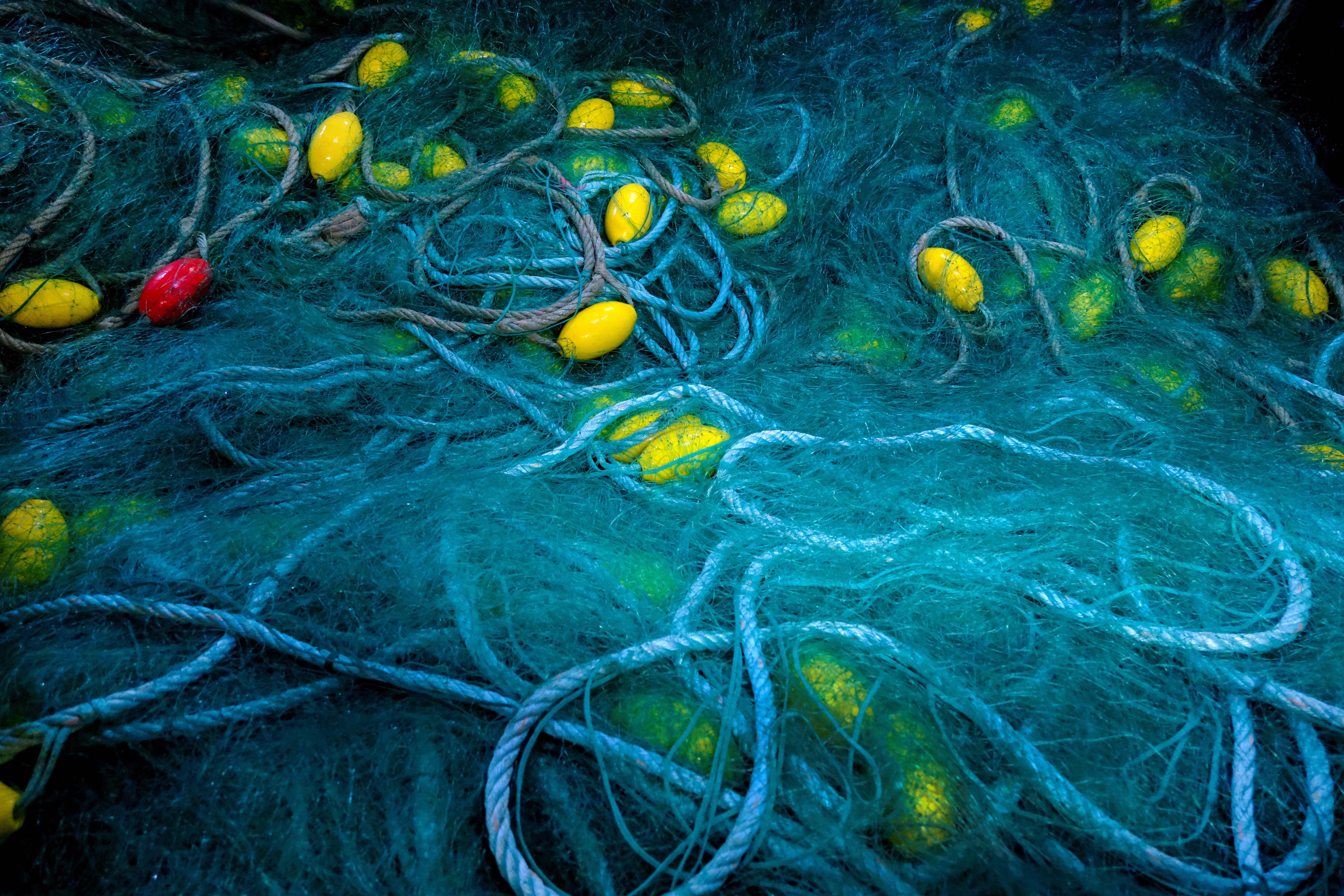 Nets are seen on the floor of the Sarridal ship before departing on a fishing trip to the Atlantic Ocean, near Cedeira, Galicia