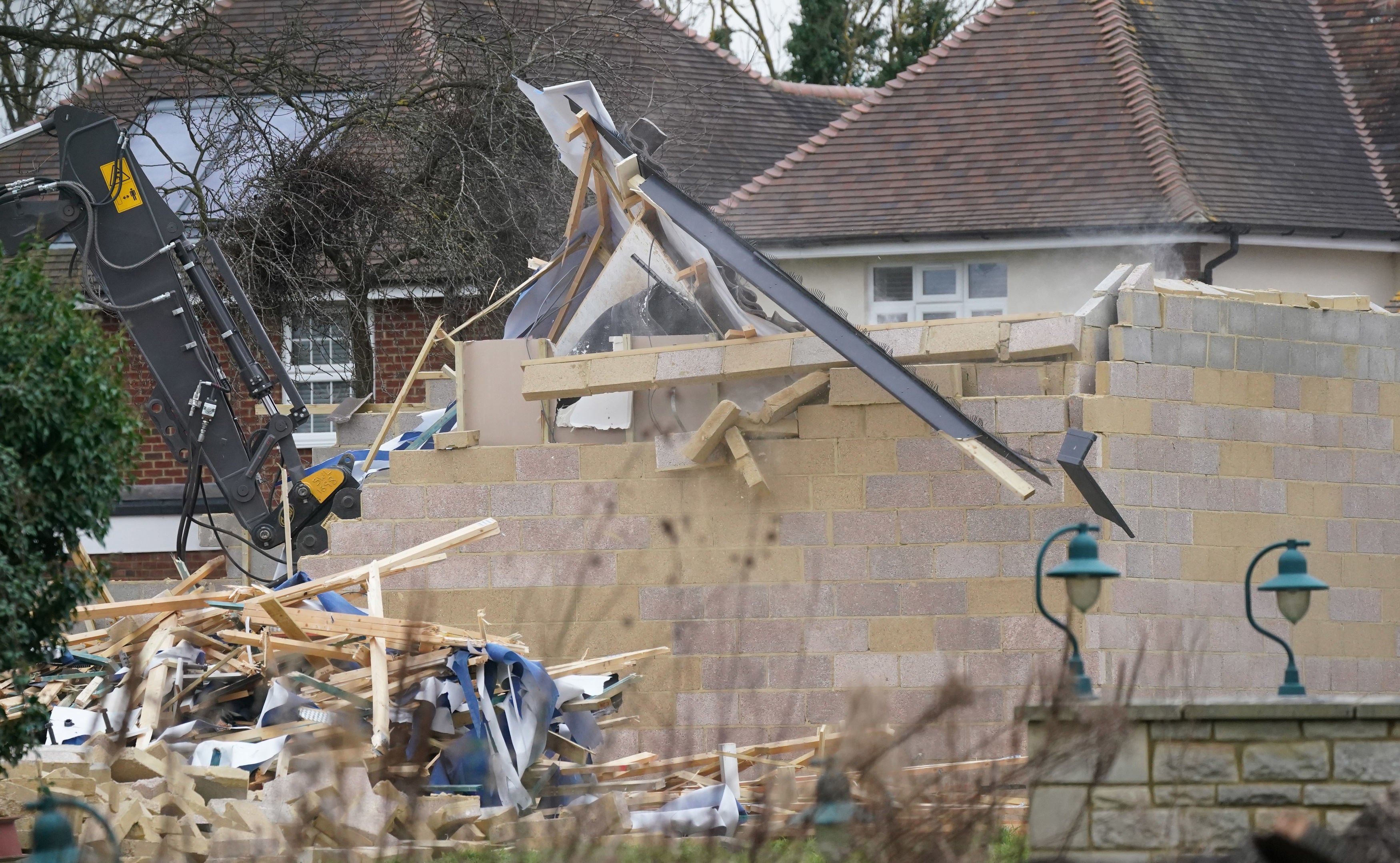 A wall of the spa block remains while the demolition takes place