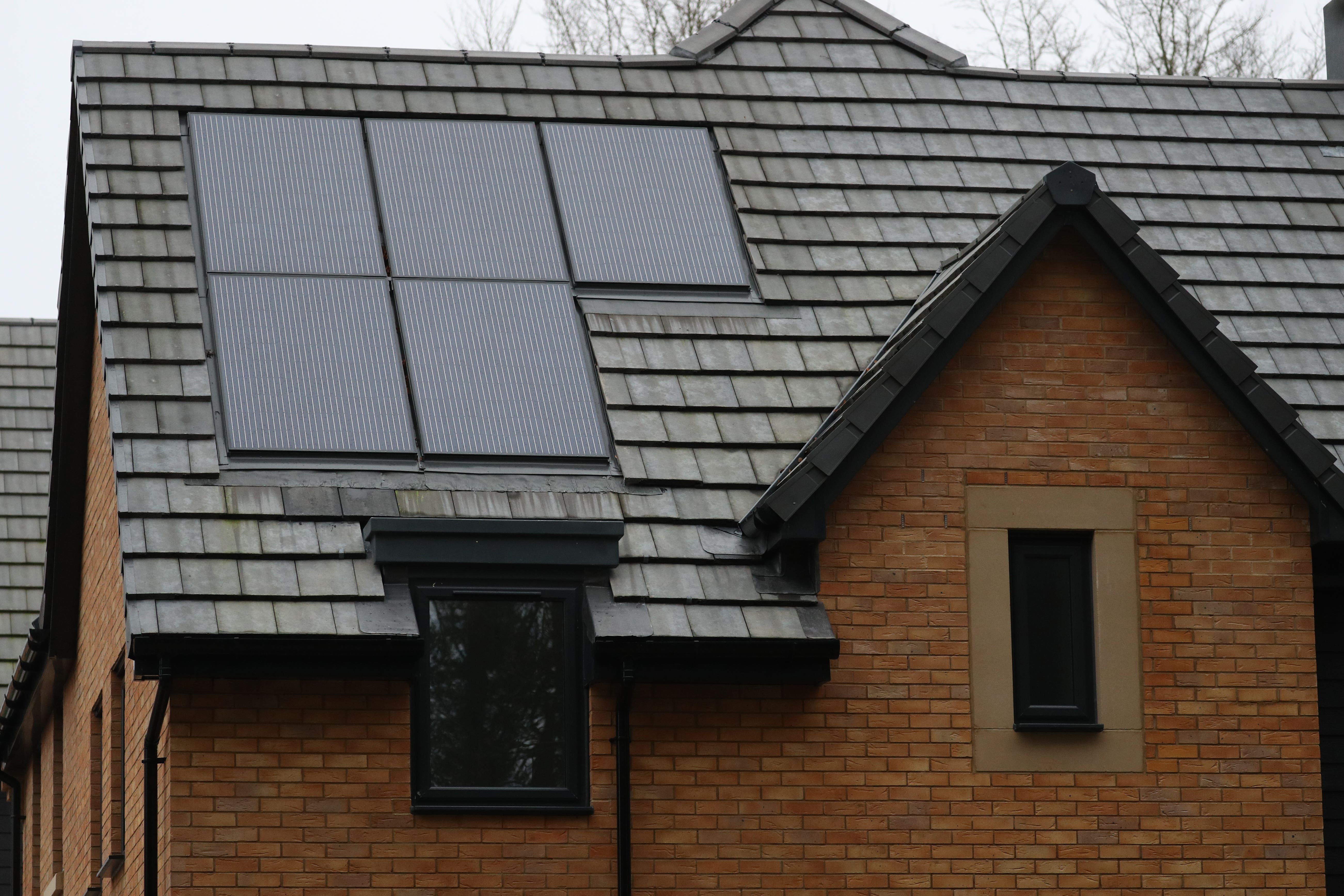 Solar panels on a new home (Andrew Matthews/PA)