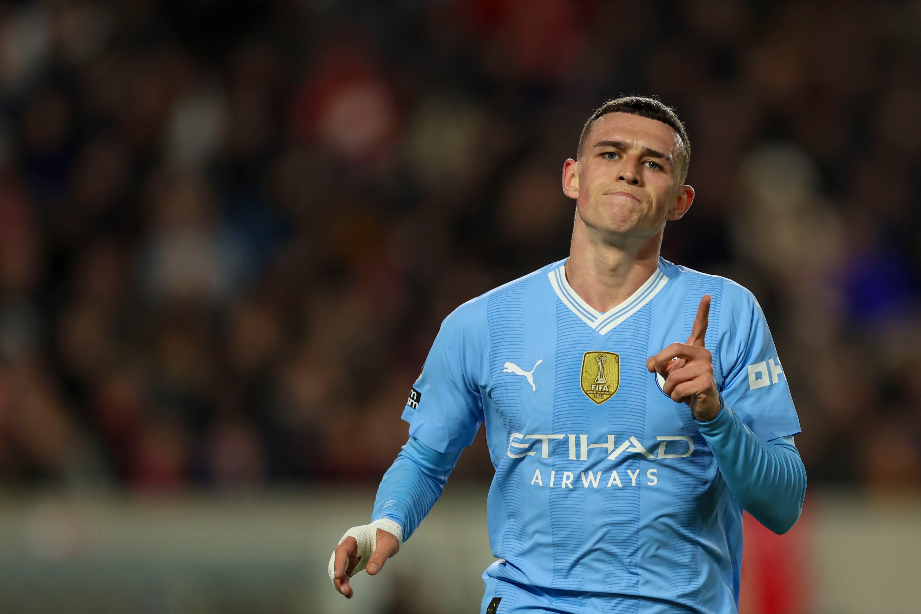 Phil Foden celebrates his hat-trick