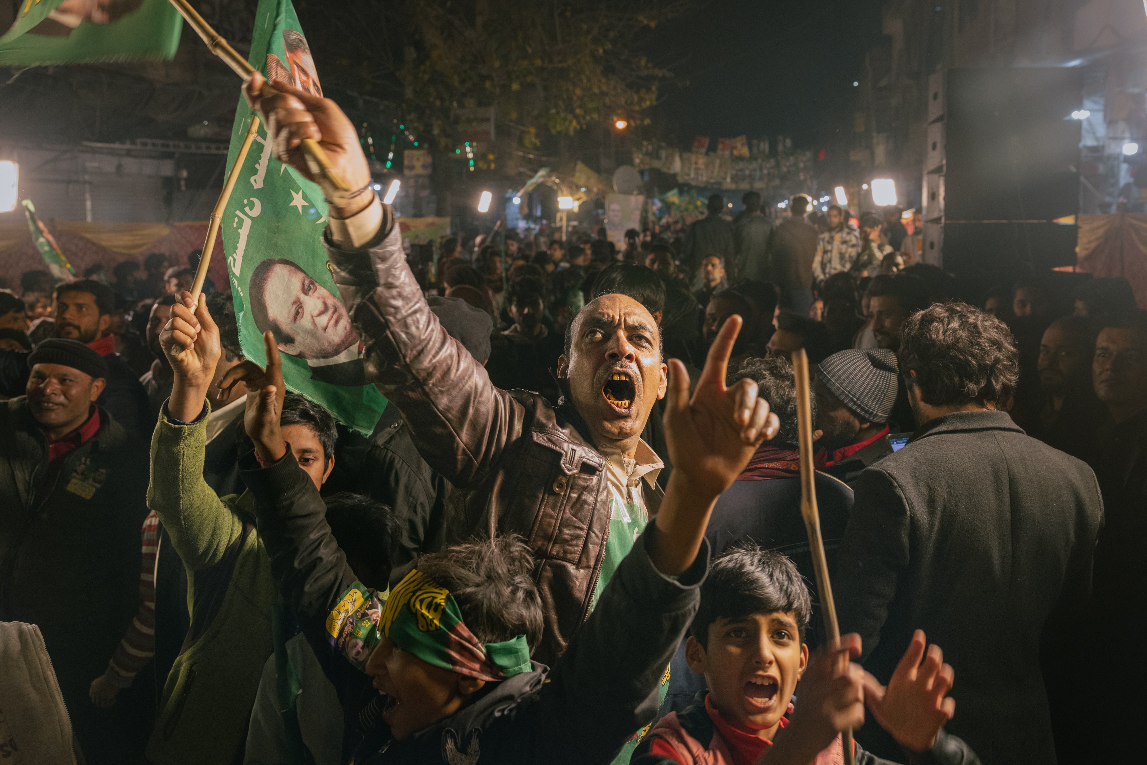 People attend a rally organised by the PML-N party of former premier Nawaz Sharif in Lahore, Pakistan