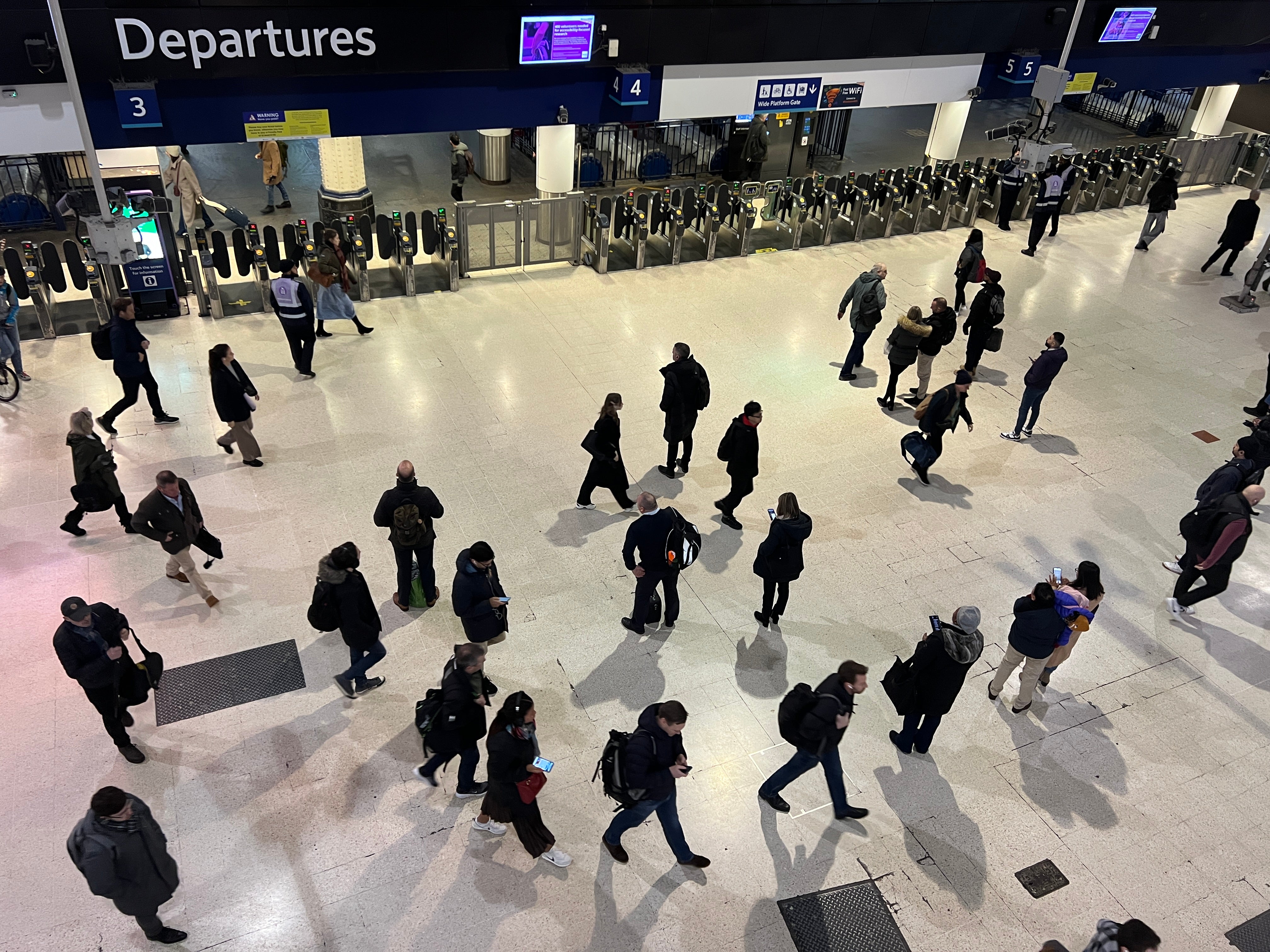 Which way now? Commuters at London Waterloo station, hub for South Western Railway