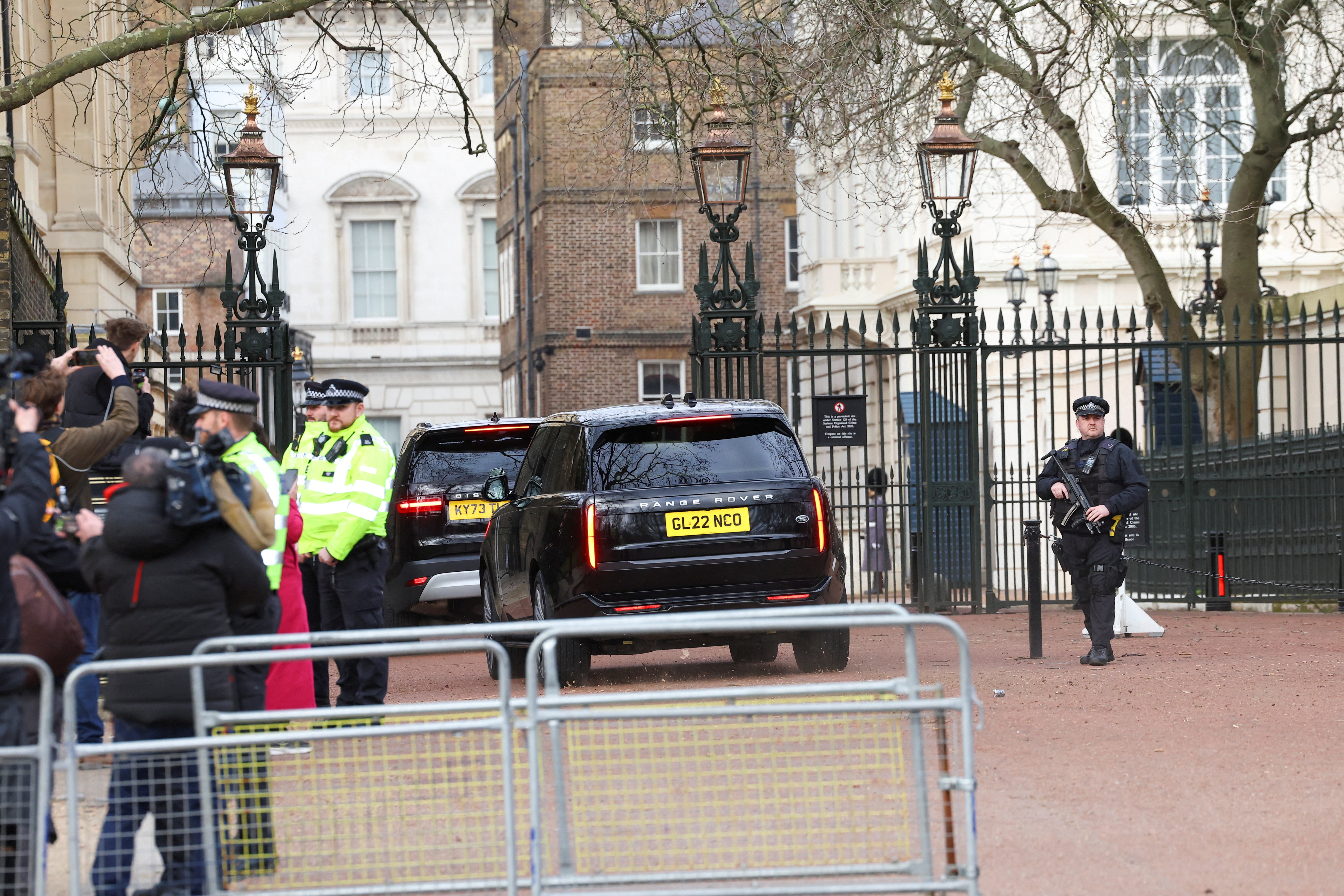 A car believed to be transporting Prince Harry enters Clarence House, the home of the King, the day after it was announced Charles has been diagnosed with cancer