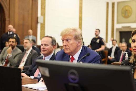 Former U.S. President Donald Trump sits in the courtroom during his civil fraud trial at New York Supreme Court on January 11, 2024 in New York City.