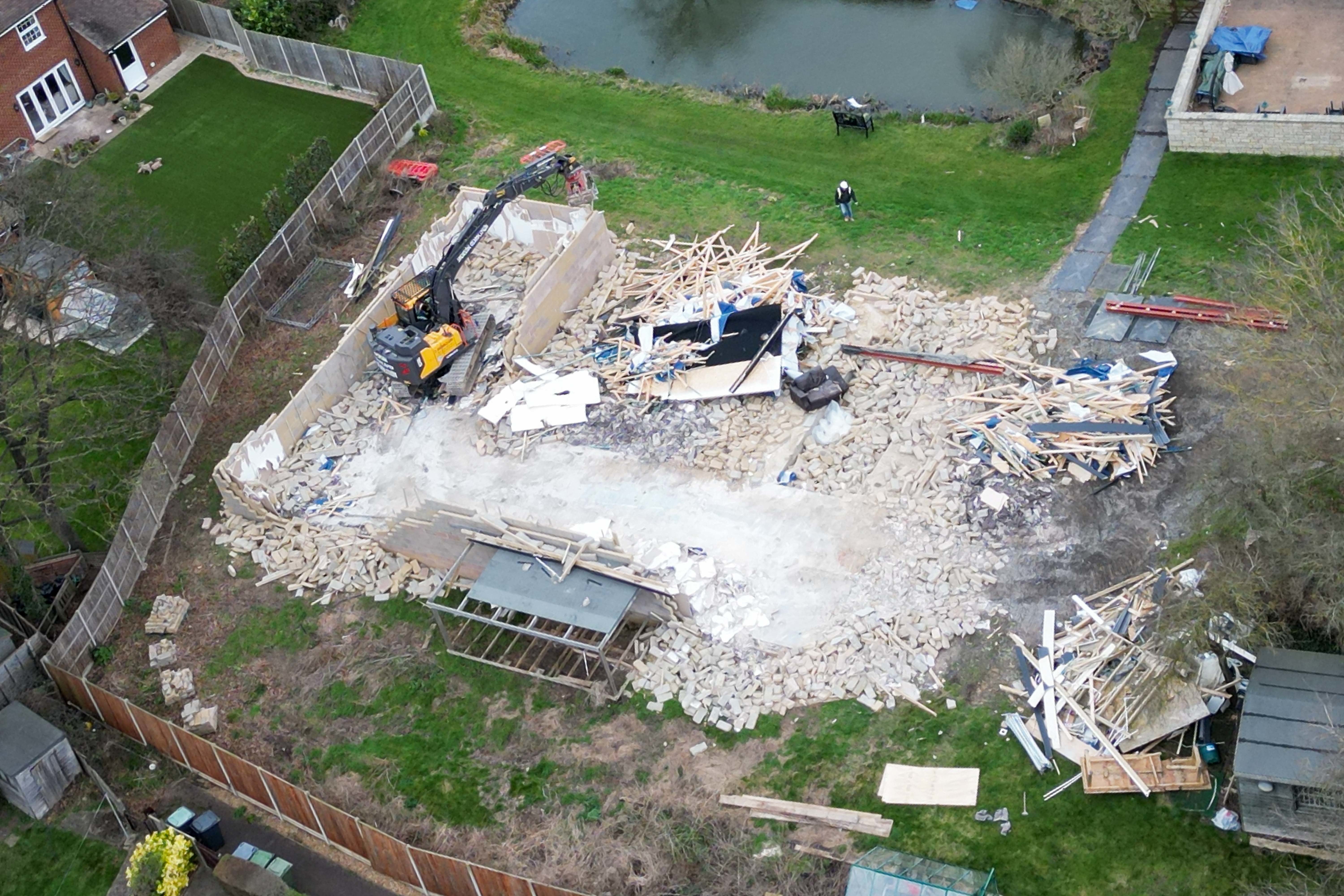 Work taking place to demolish the unauthorised spa pool block