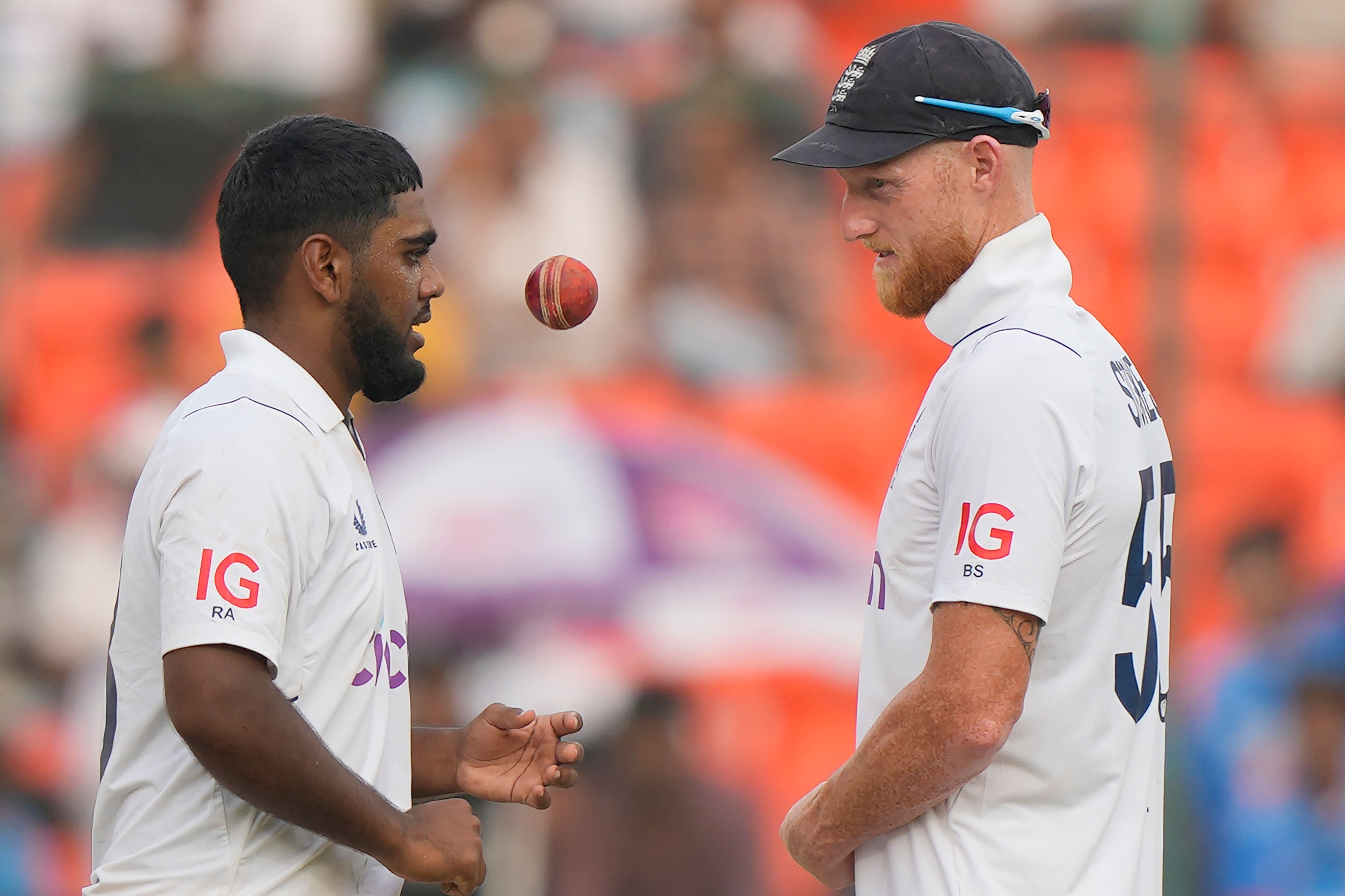 Rehan Ahmed, left, is loving his role as England’s leg-spin option under Ben Stokes (Mahesh Kumar A./AP)