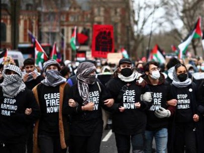 Pro-Palestinian supporters shout slogans and wave Palestinian flags