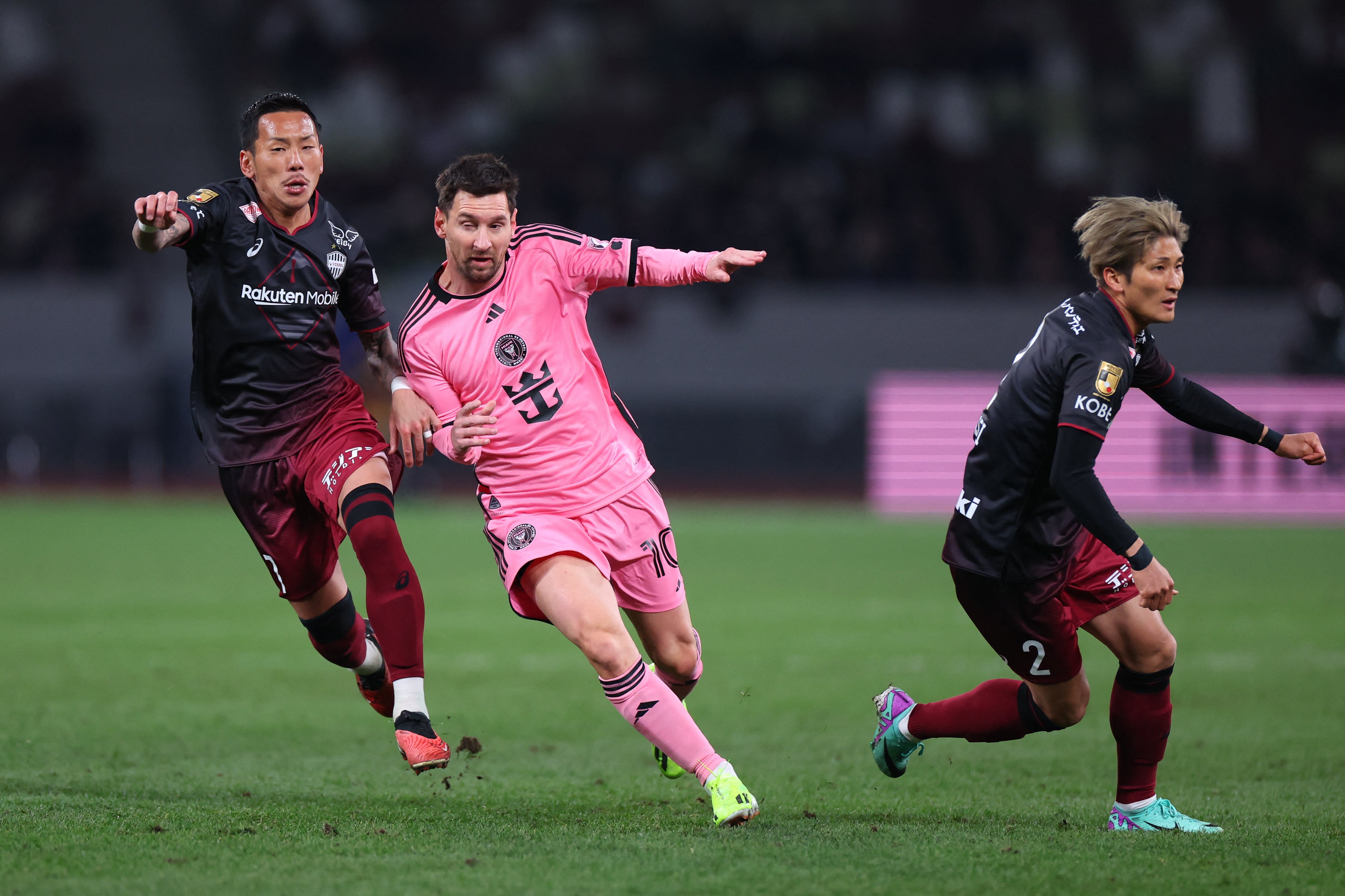 Inter Miami CF forward Lionel Messi (10) runs into space as Vissel Kobe midfielder Yosuke Ideguchi (7) defends during the second half of a preseason friendly at Japan National Stadium