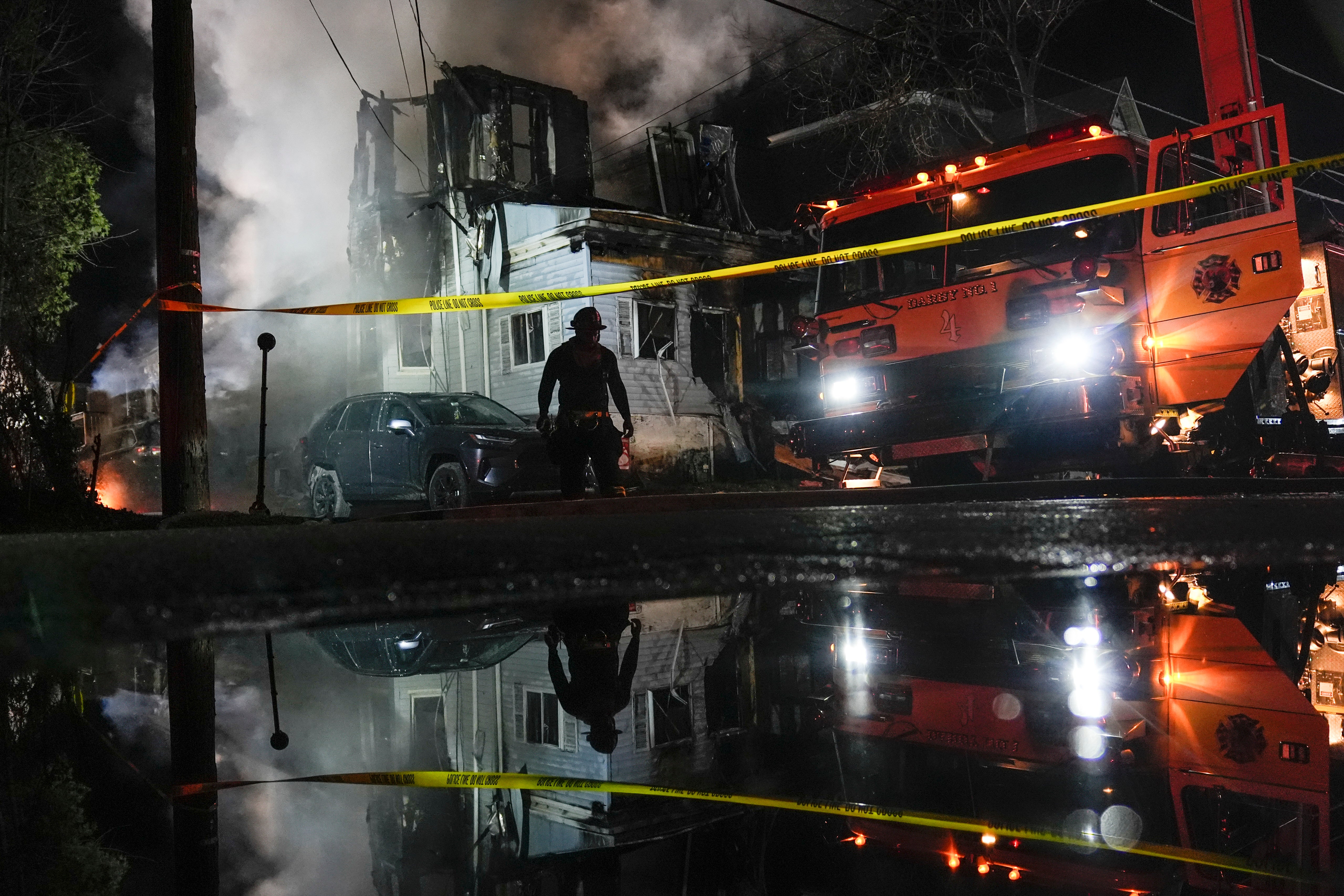 APTOPIX Officers Wounded House Fire