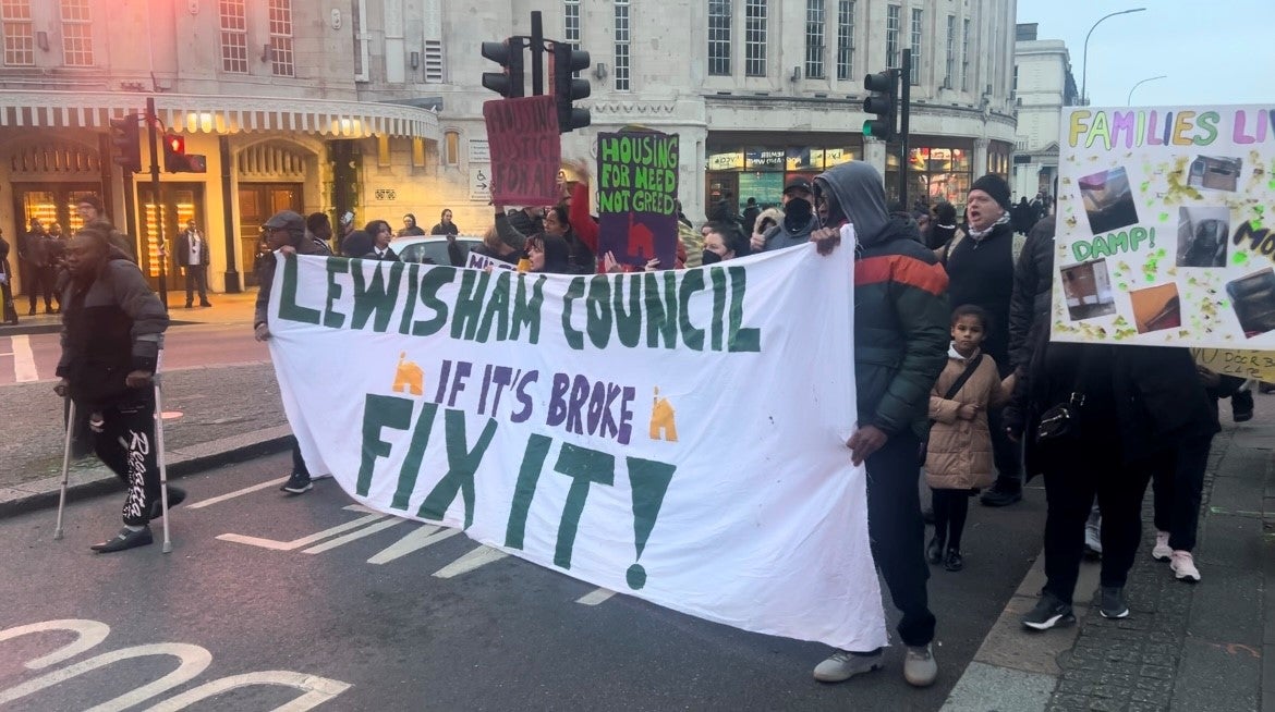 Families and residents from Milford Towers walk to Lewisham Council to protest their housing conditions