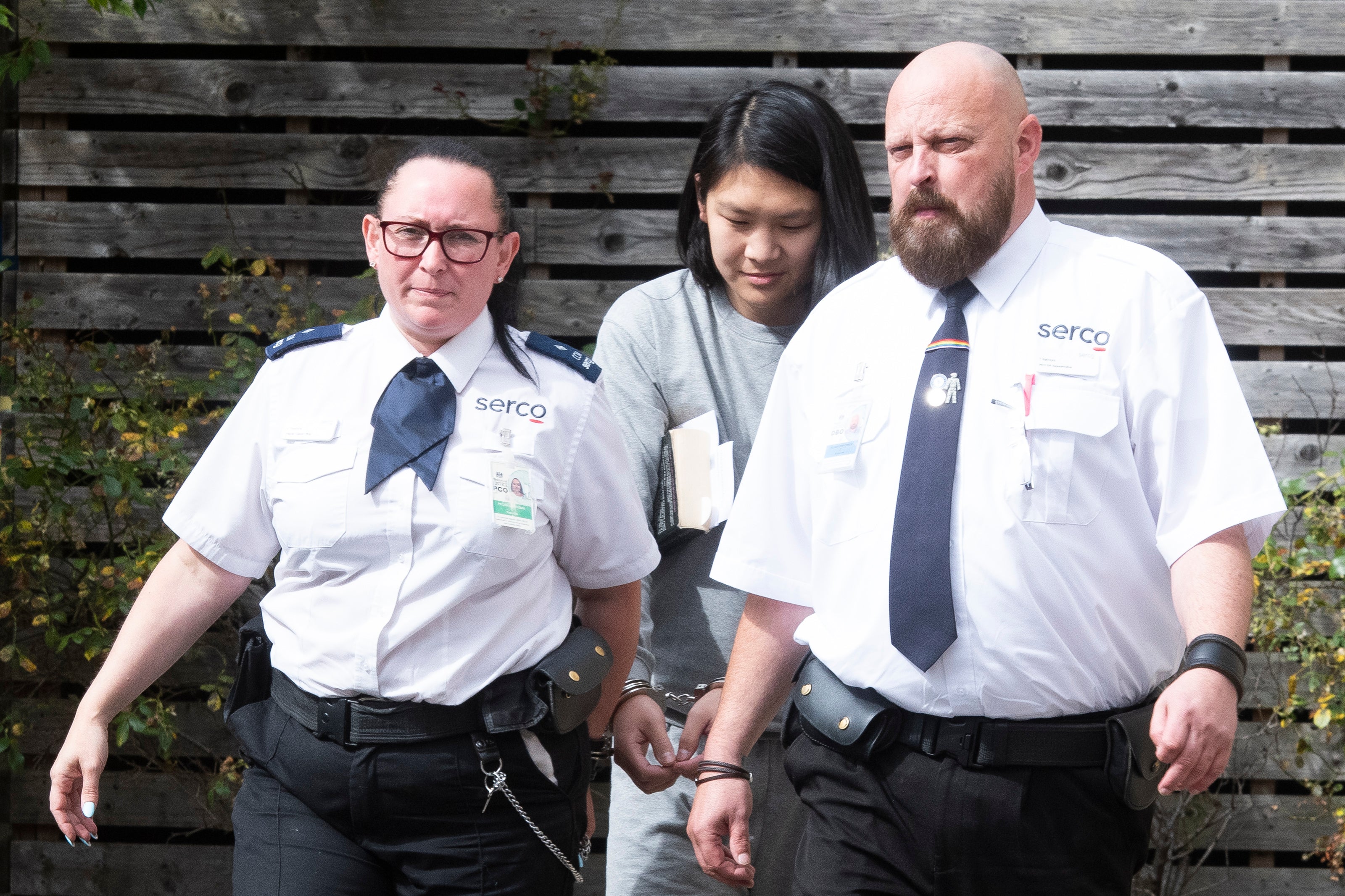 Scarlet Blake, centre, is on trial for murder