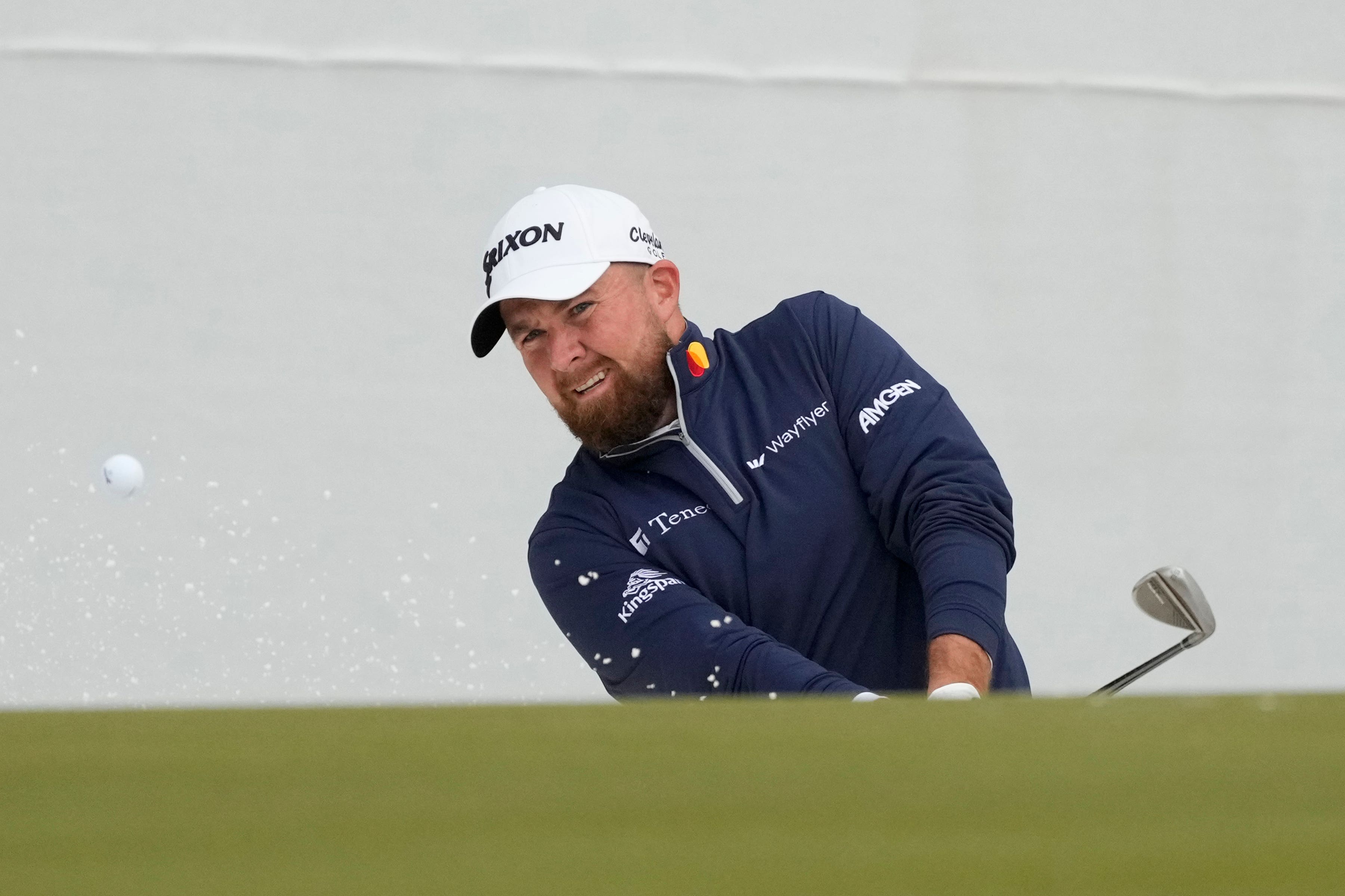 Shane Lowry, of Ireland, hits out of a bunker on the 16th hole during the first round of the Phoenix Open (Ross D Franklin, AP)