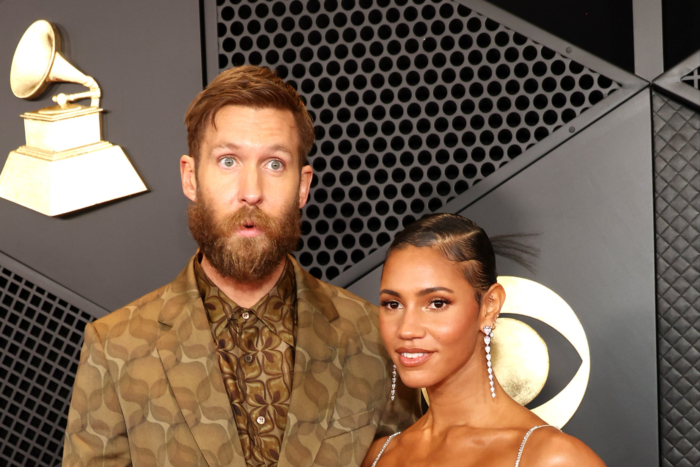 Calvin Harris and his wife Vick Hope photographed at the Grammy Awards 2024