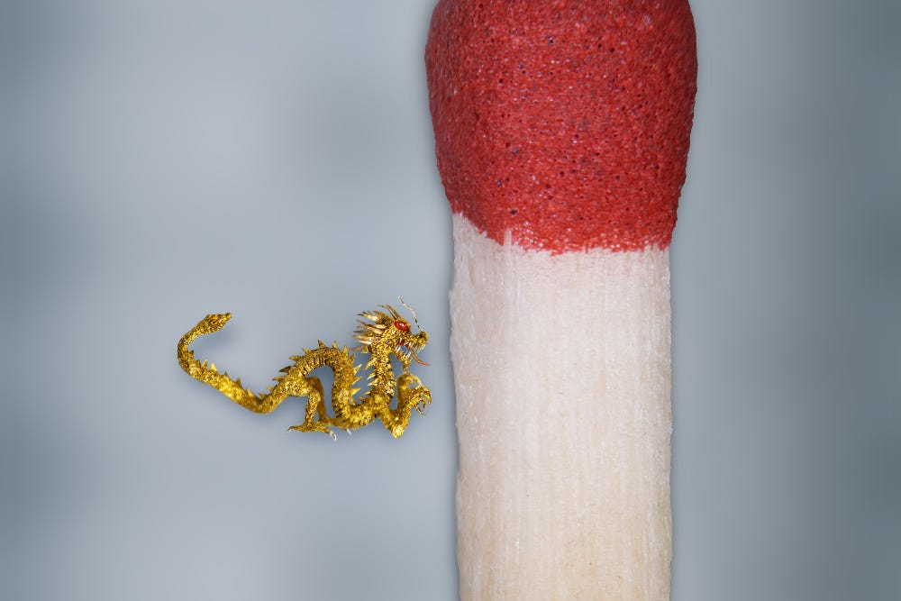 Micro-sculptor Willard Wigan has created a tiny golden dragon as ‘a symbol of strength’ for the Lunar New Year (Paul Ward)