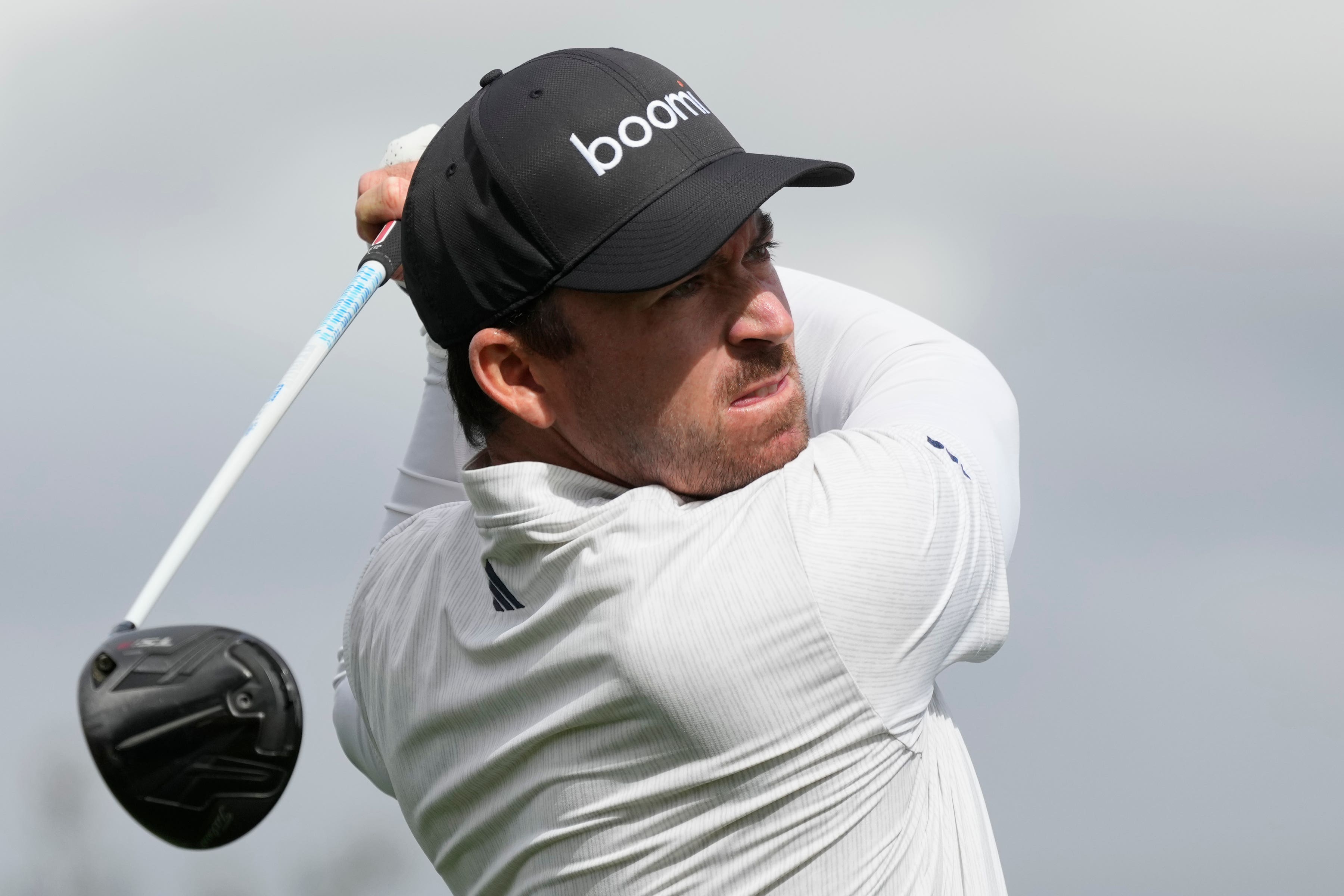 Nick Taylor hits his tee shot on the second hole during the second round of the Phoenix Open (Ross D Franklin/AP)