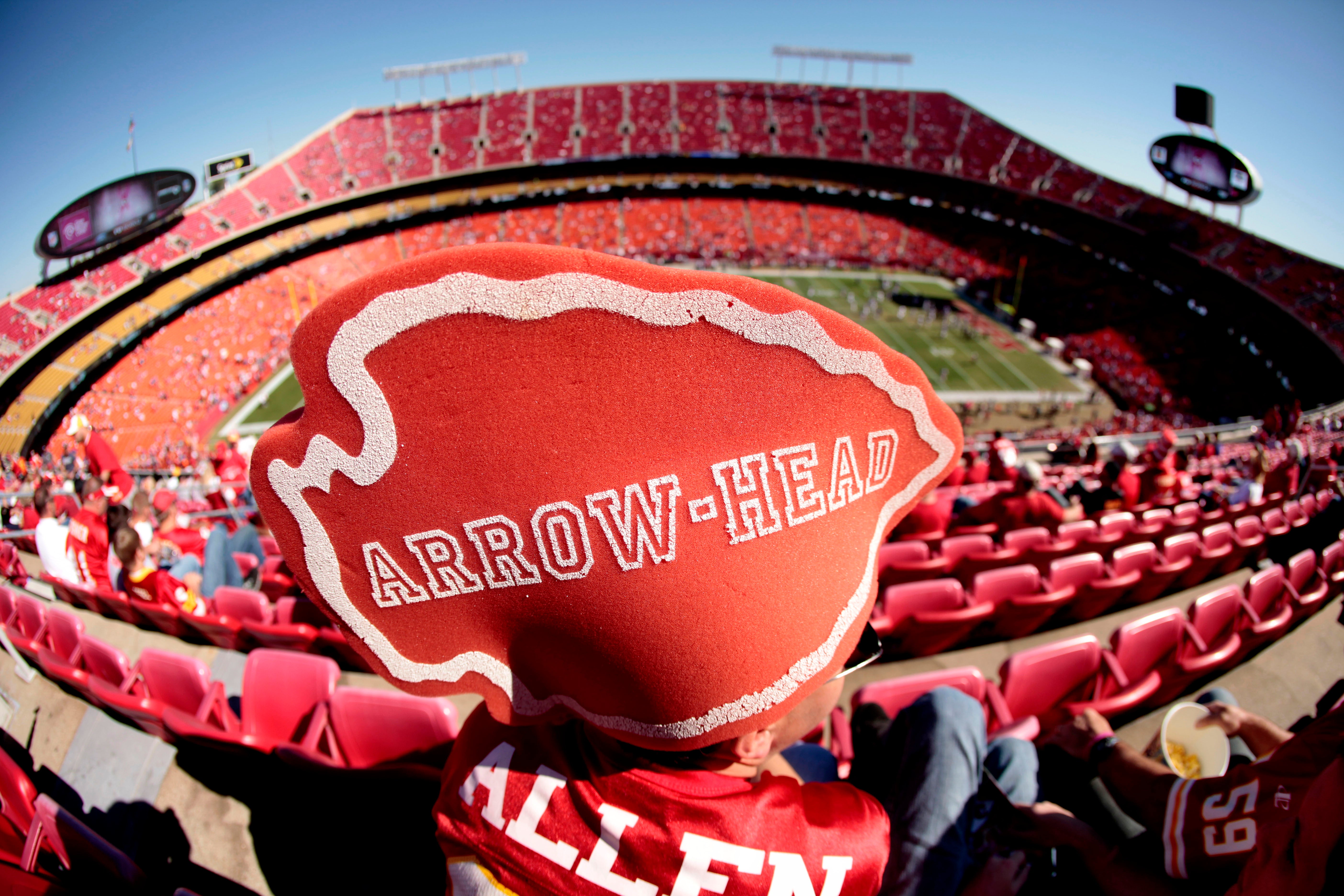 FILE - A Kansas City Chiefs fan watches pregame activities before an NFL football game against the Minnesota Vikings