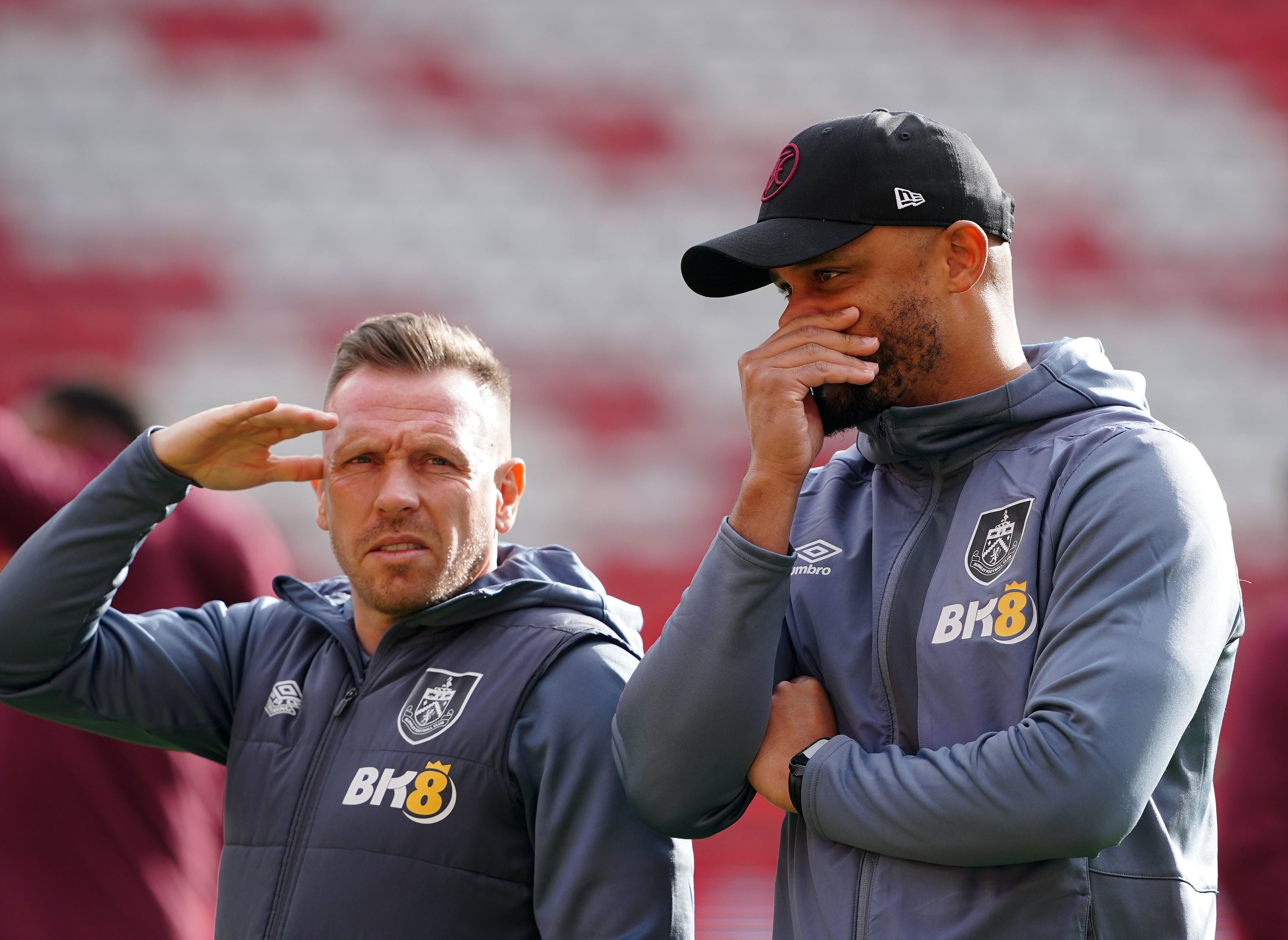 Vincent Kompany, right, with coach Craig Bellamy at Anfield