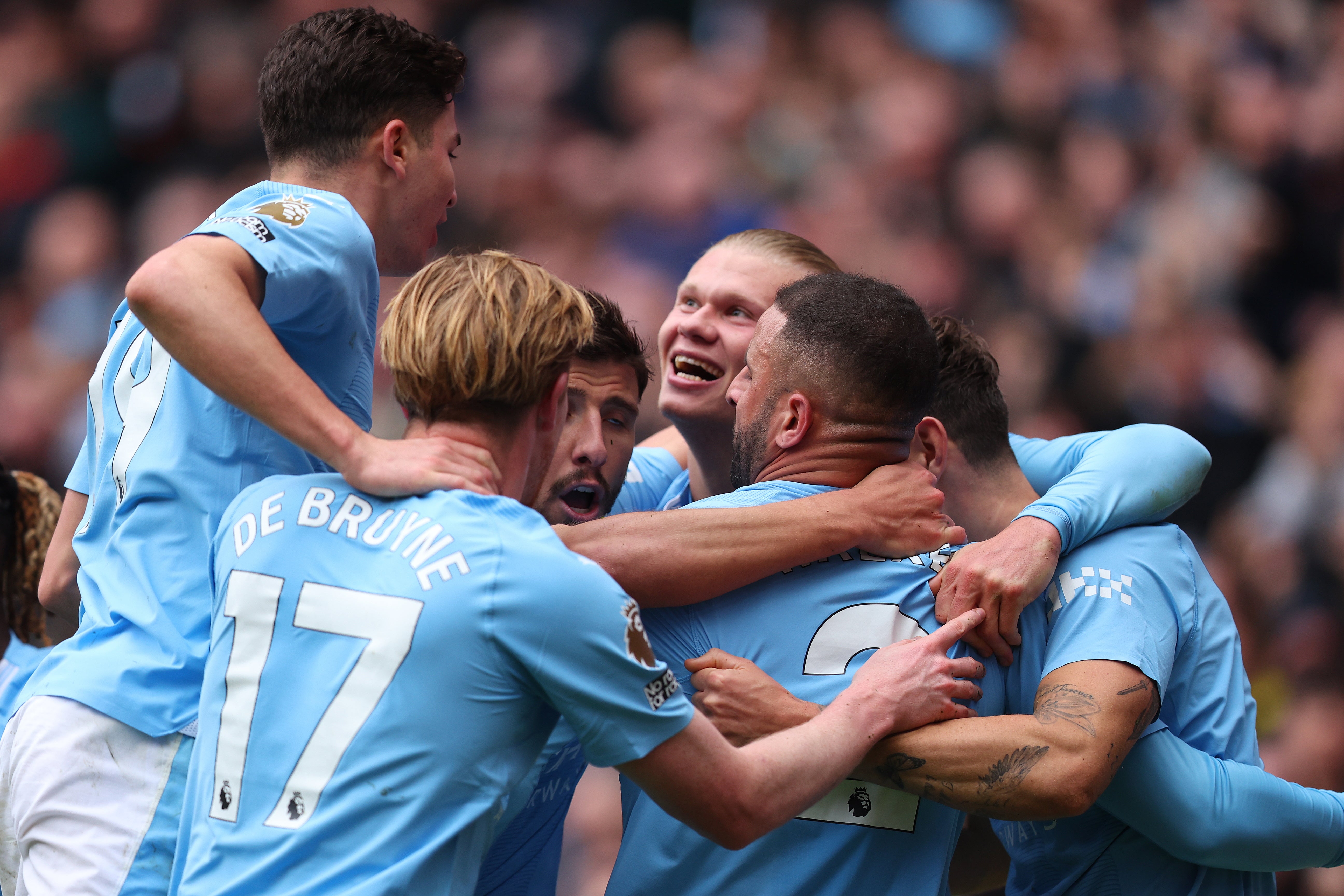 Erling Haaland is swamped by his teammates after scoring