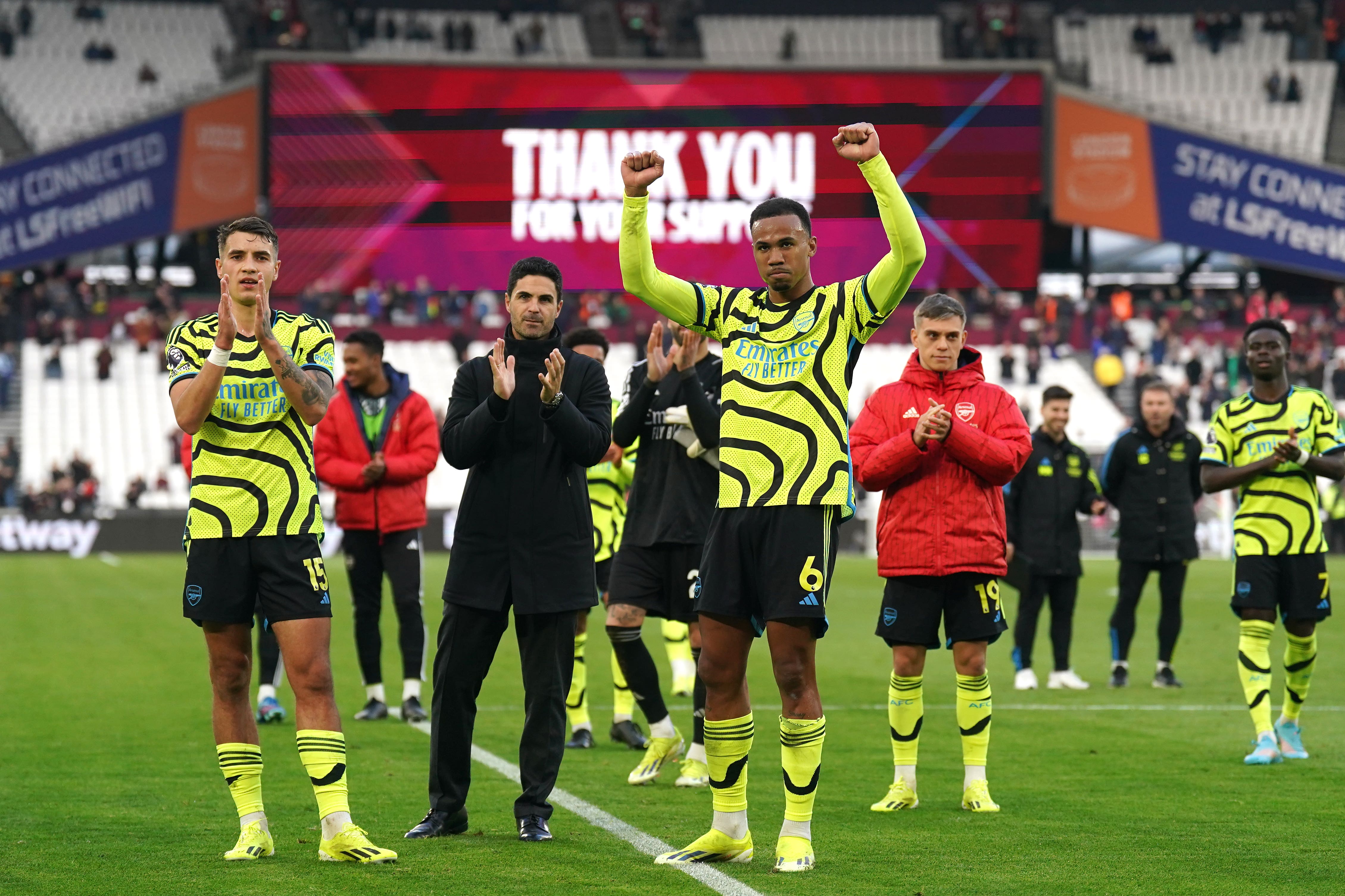 Mikel Arteta, centre left, and Arsenal celebrate victory over West Ham (Adam Davy/PA)