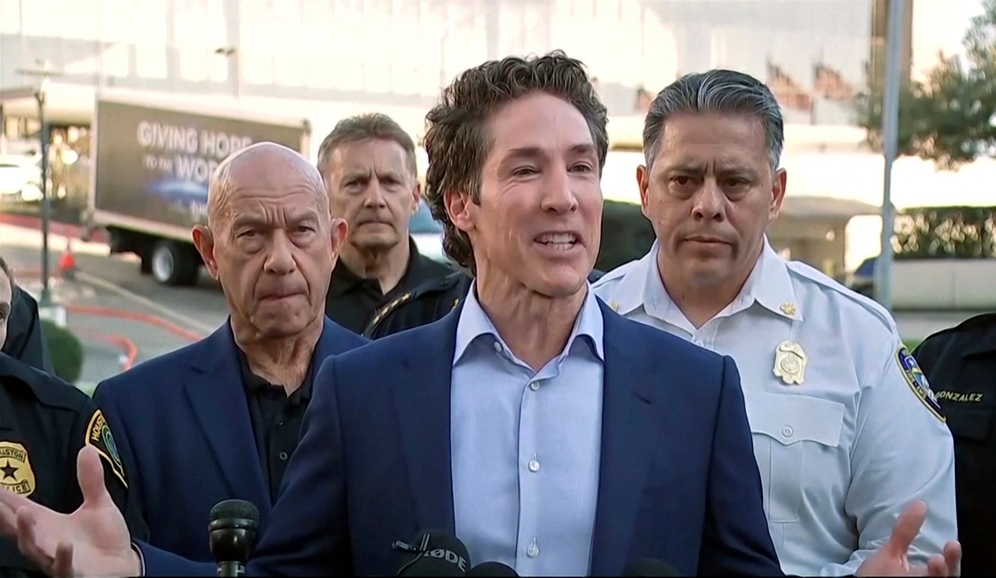 Pastor Joel Osteen speaks to the media after the shooting